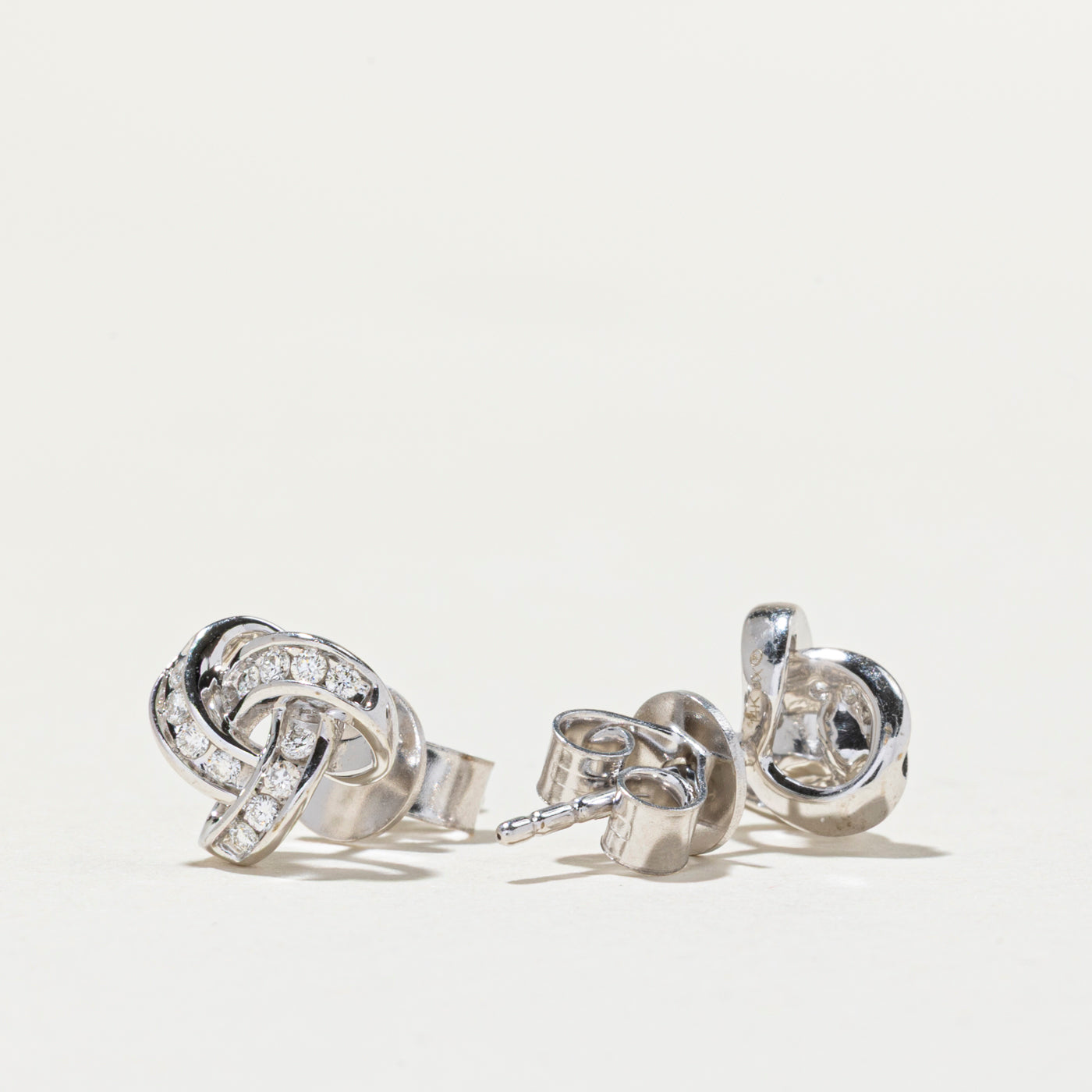 14K Diamond Interlocking Design Stud Earrings | 0.14ctw