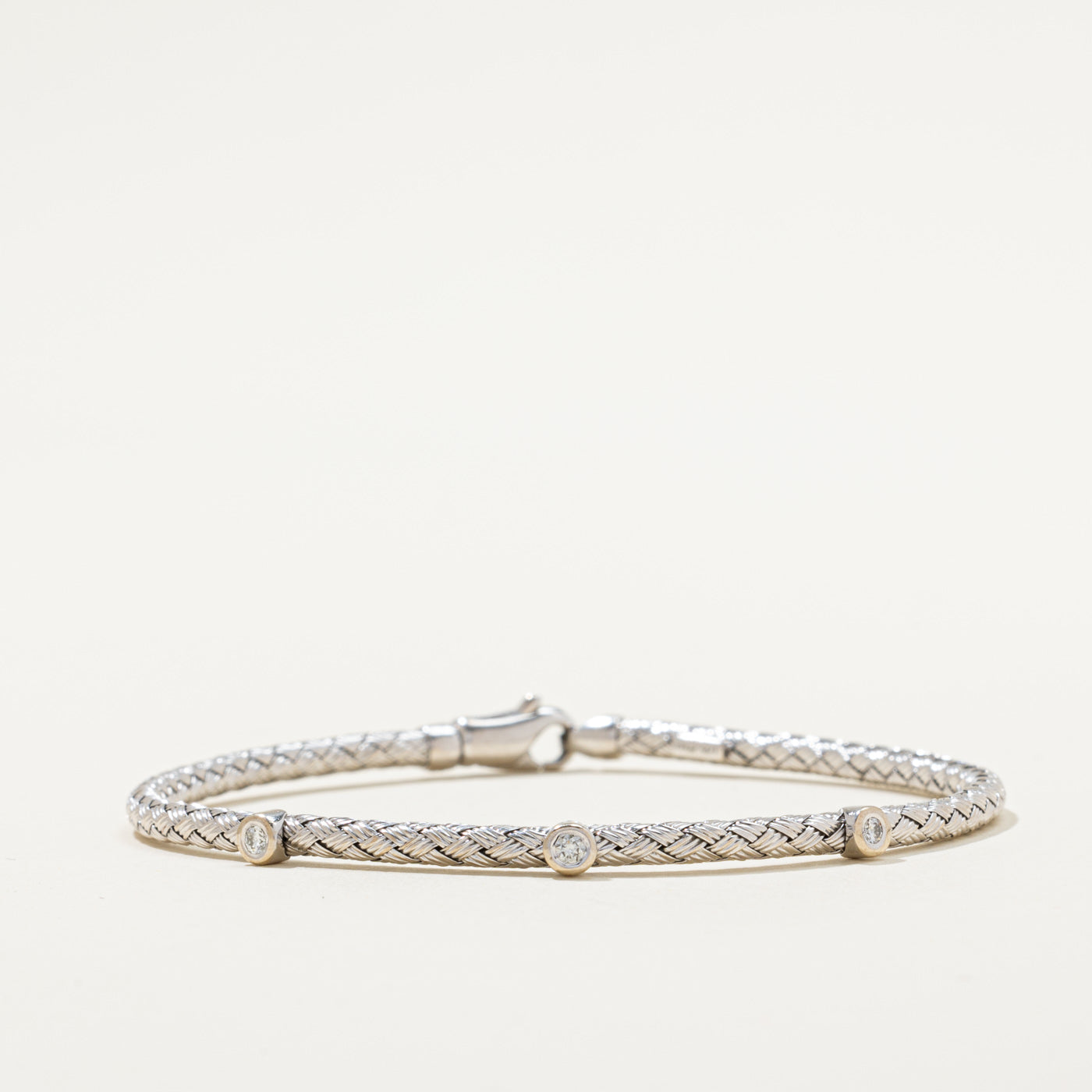 Bracelet tissé à trois diamants | 0,10 ct au total | 17,8 cm