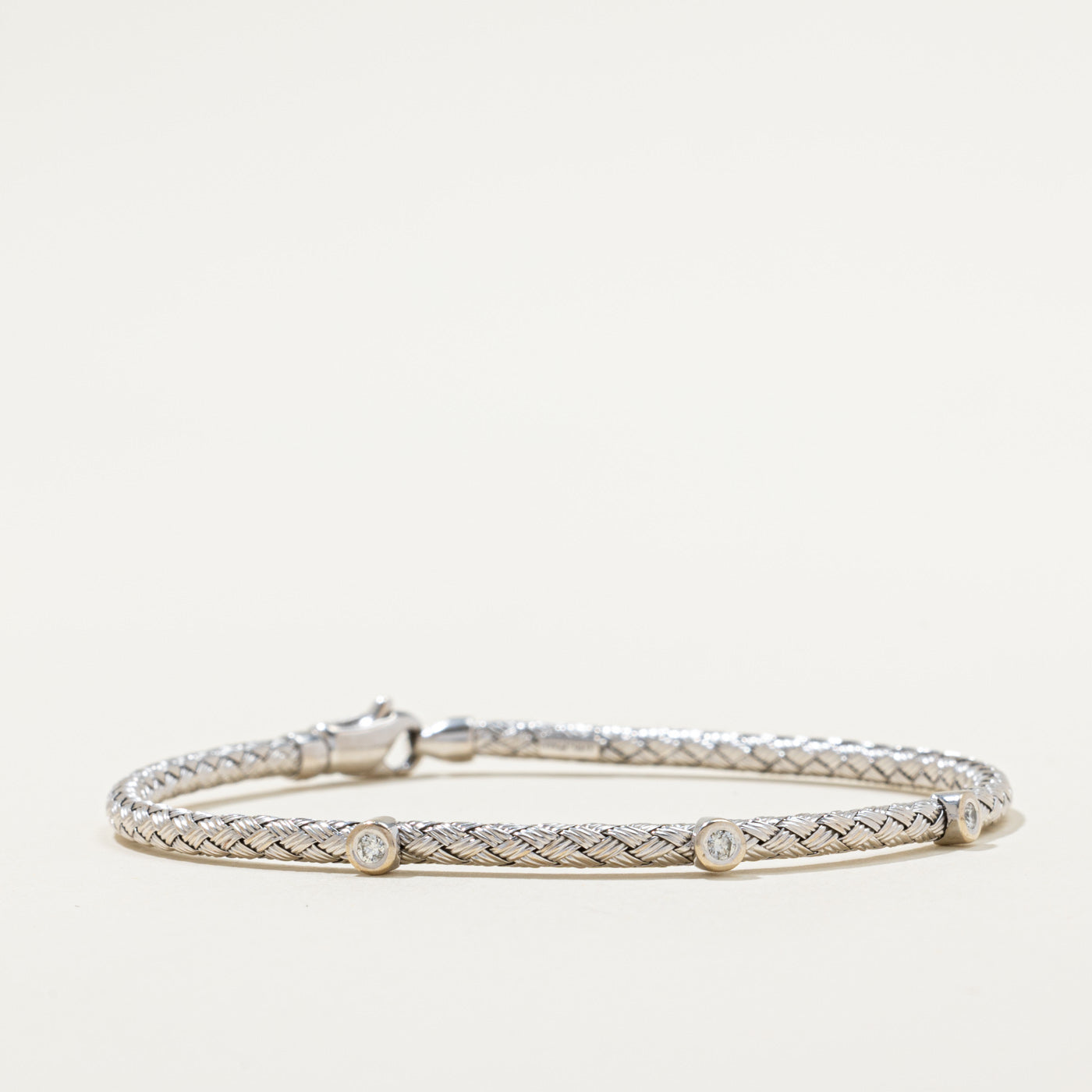 Bracelet tissé à trois diamants | 0,10 ct au total | 17,8 cm