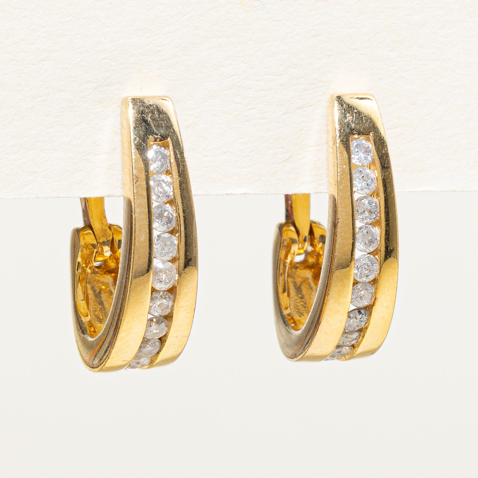 Boucles d'oreilles à fermoir loquet serties de diamants en canal | 0,42 ct