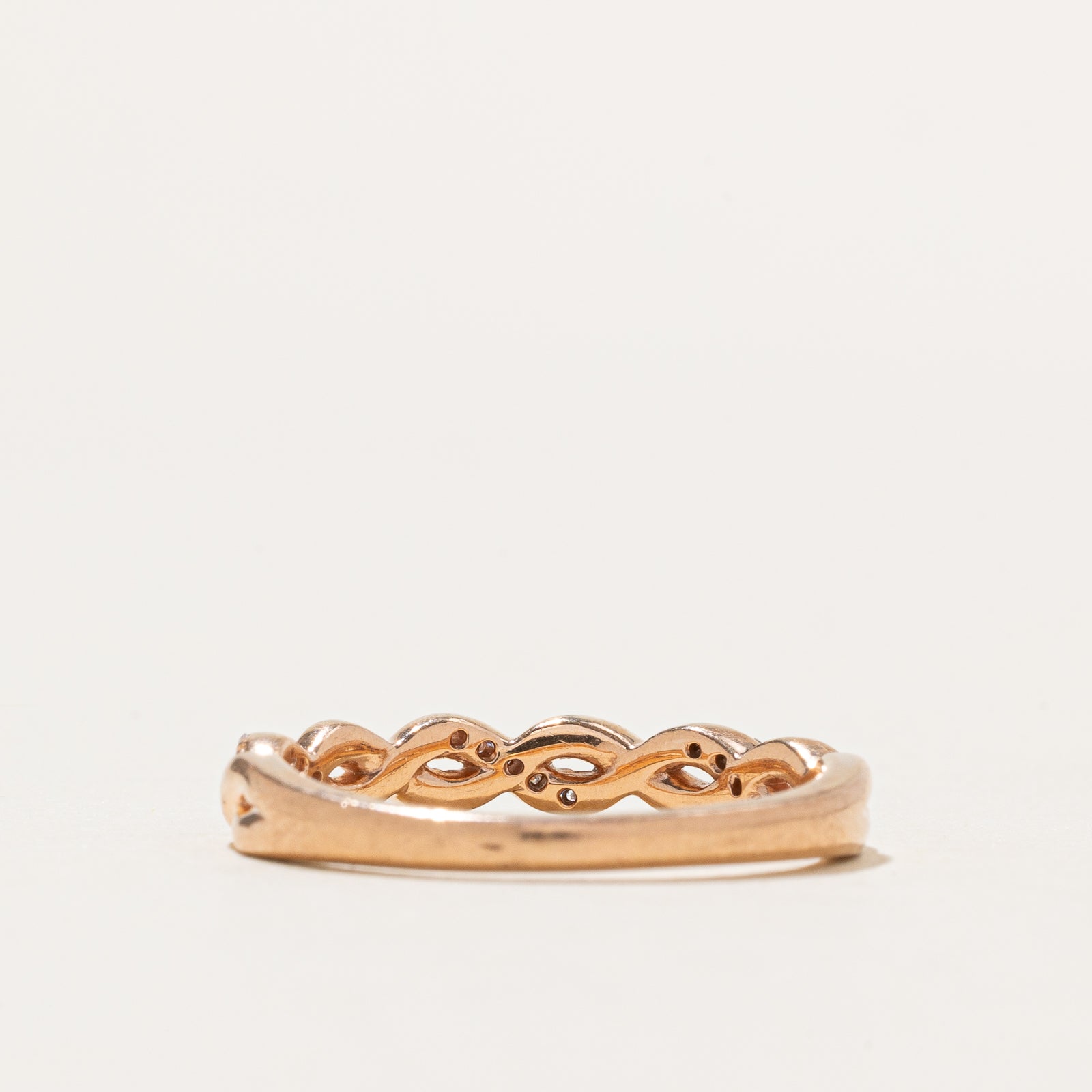 Bague torsadée en or rose 10 carats et diamants | 0,10 ct au total | Taille 7,5