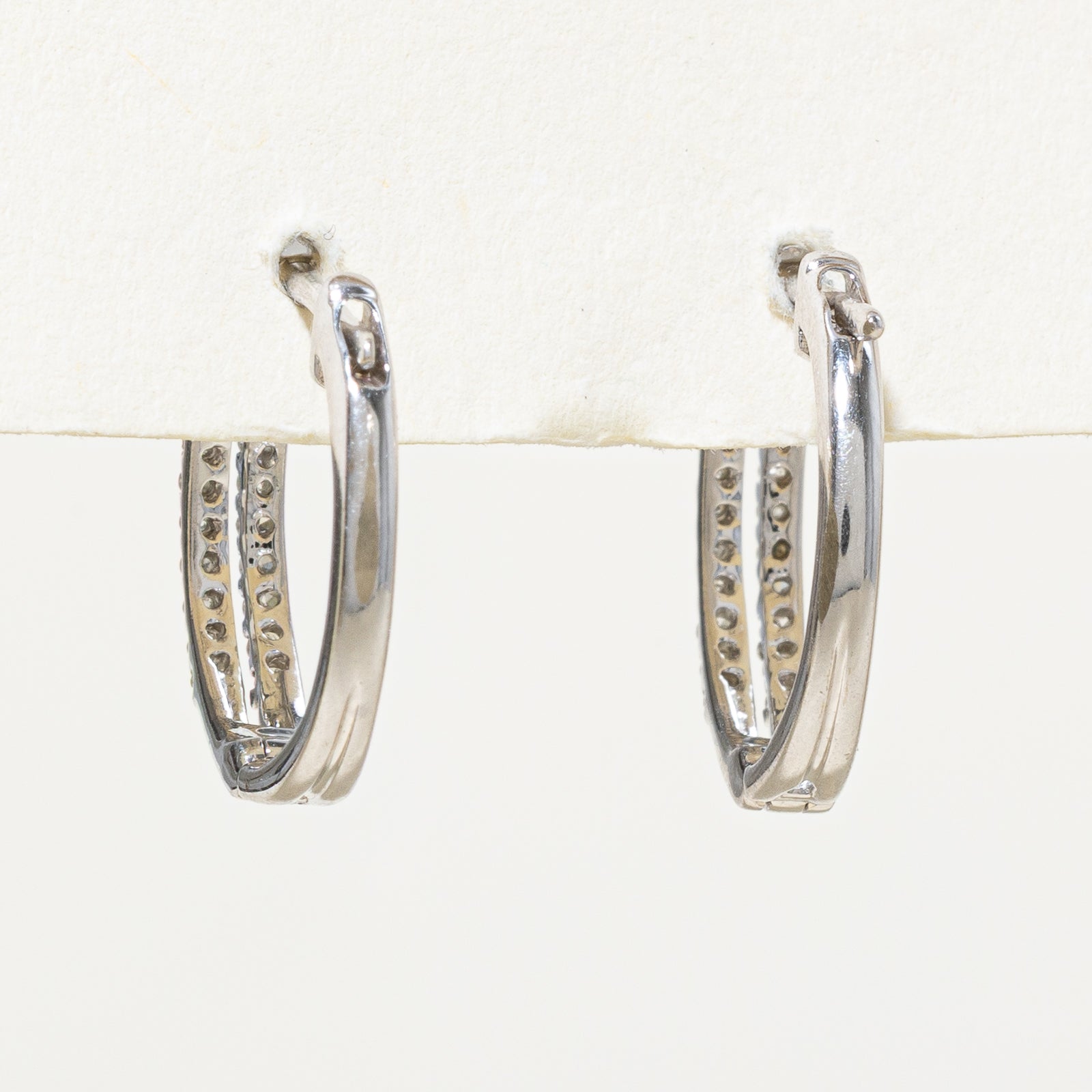 Boucles d'oreilles créoles en or 10 carats serties de diamants | 0,26 ct au total
