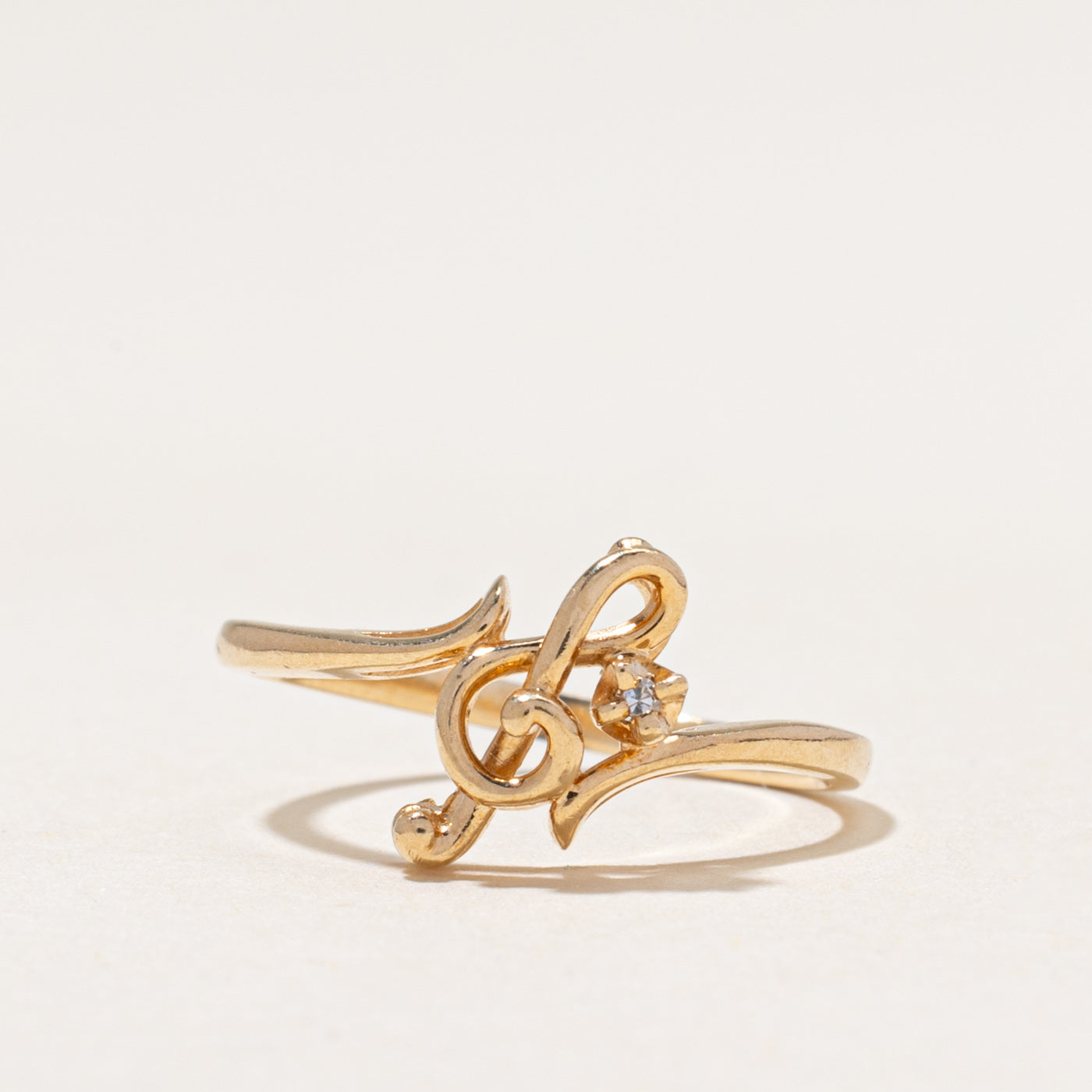 Bague en forme de clé de sol avec un diamant unique | 0,01 ct | Taille 4,75