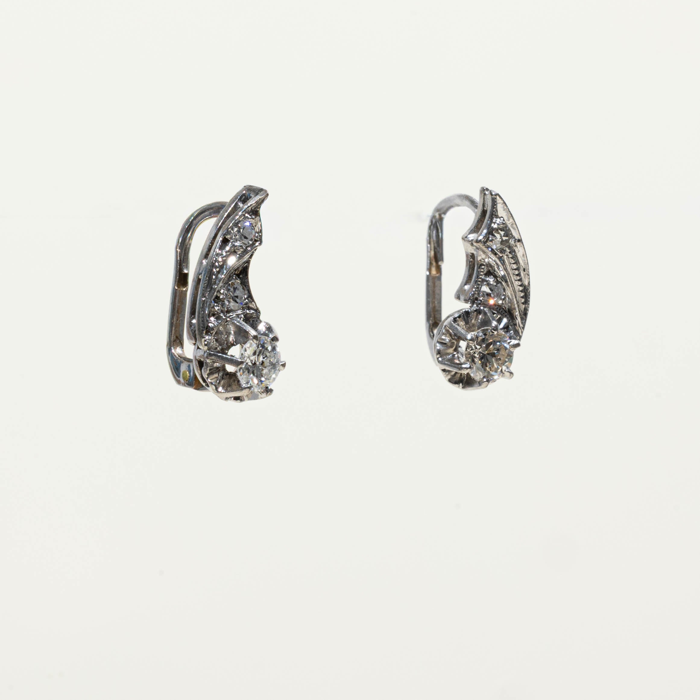 10k Illusion Set Diamond Teardrop Huggie Earrings | 0.31ctw