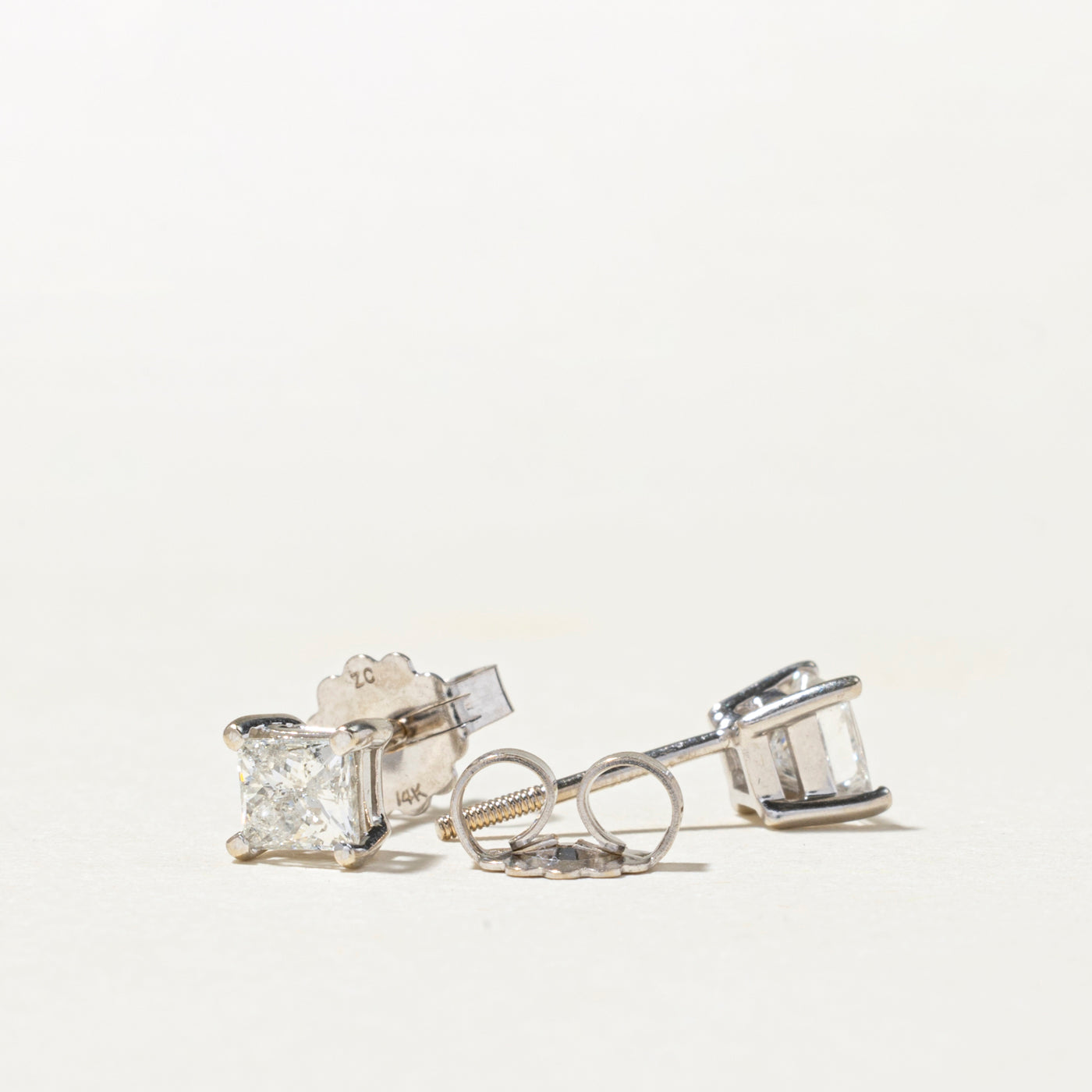 Solitaire Princess Cut Diamond Stud Earrings | 0.59ctw