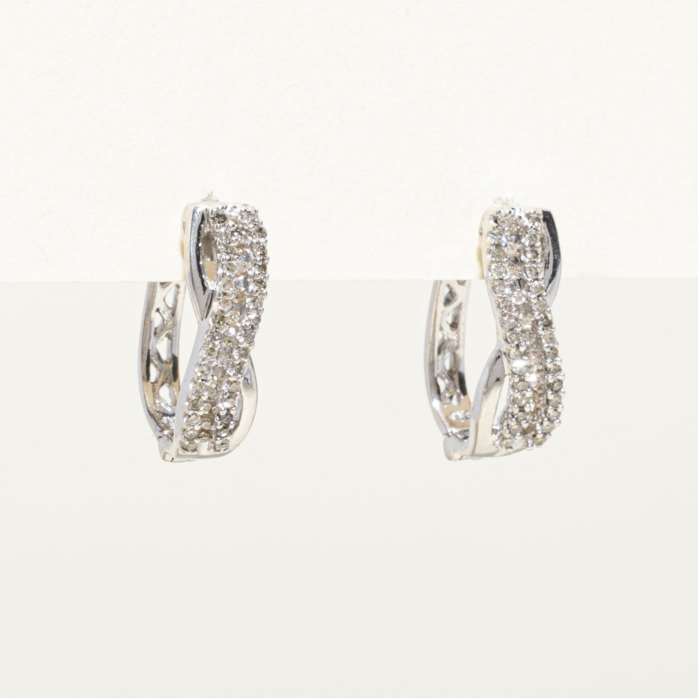 Diamond Cross Over Huggie Earrings | 0.20ctw