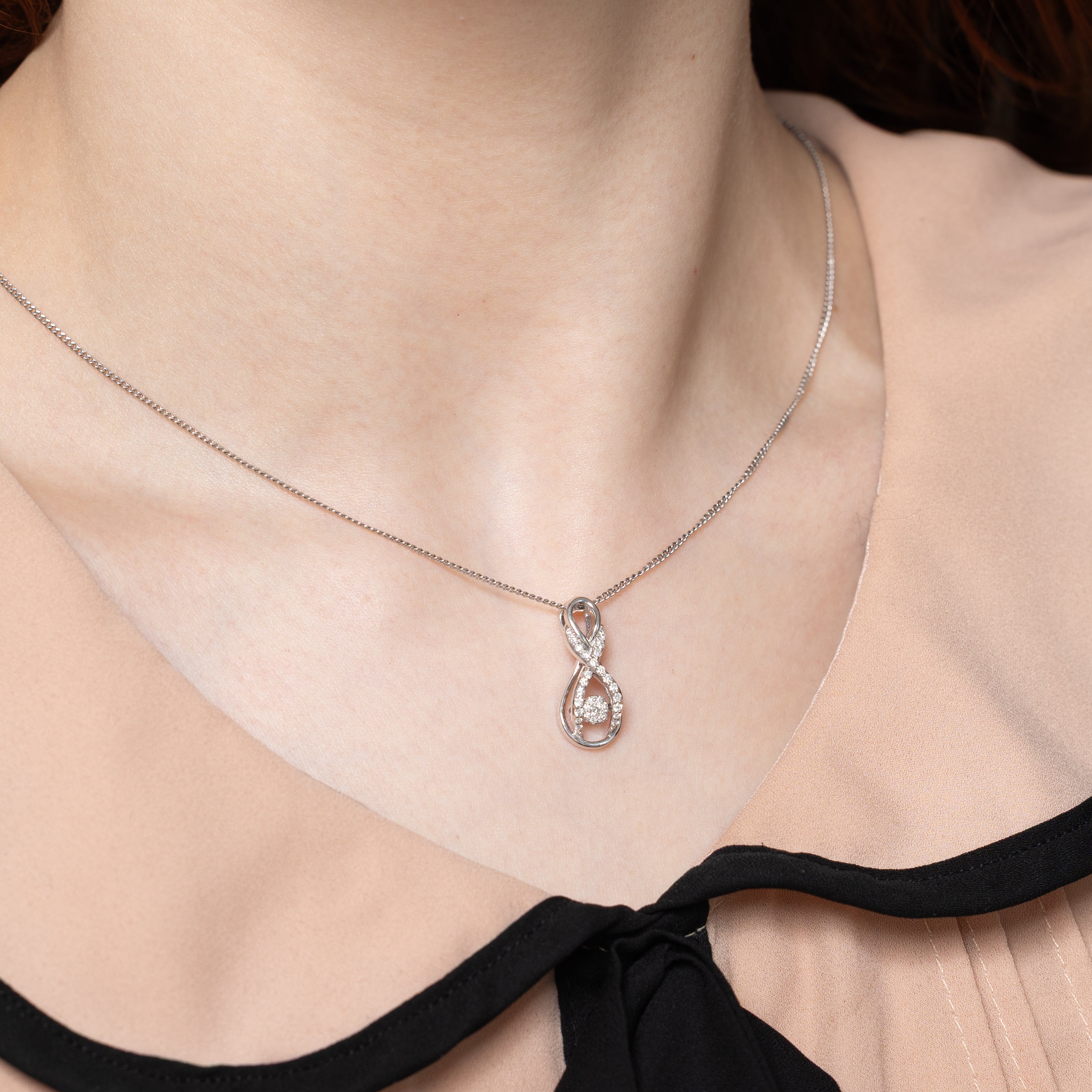Floating Diamond Cross Over Pendant | 0.21ctw