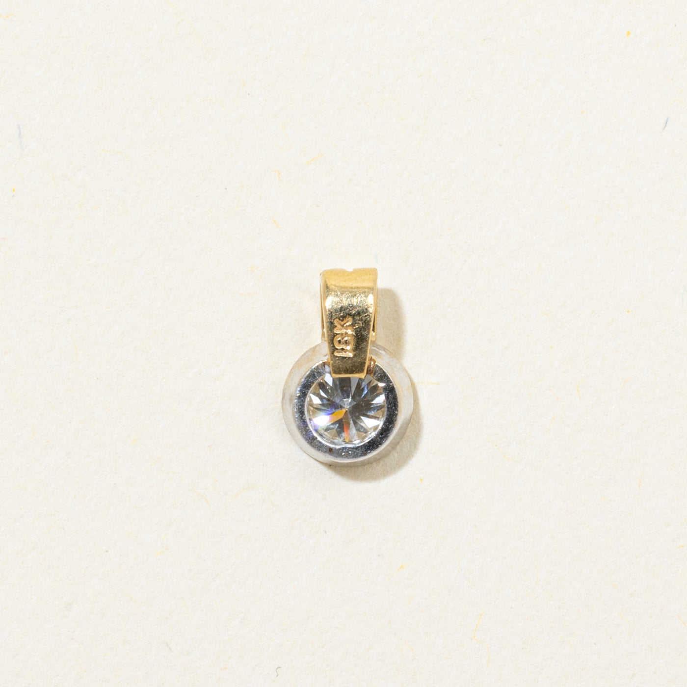 Pendentif en or 18 carats bicolore serti clos avec diamant de 0,30 ct |