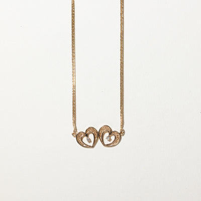 Diamond Two Hearts Pendant Necklace | 0.04ctw | 9