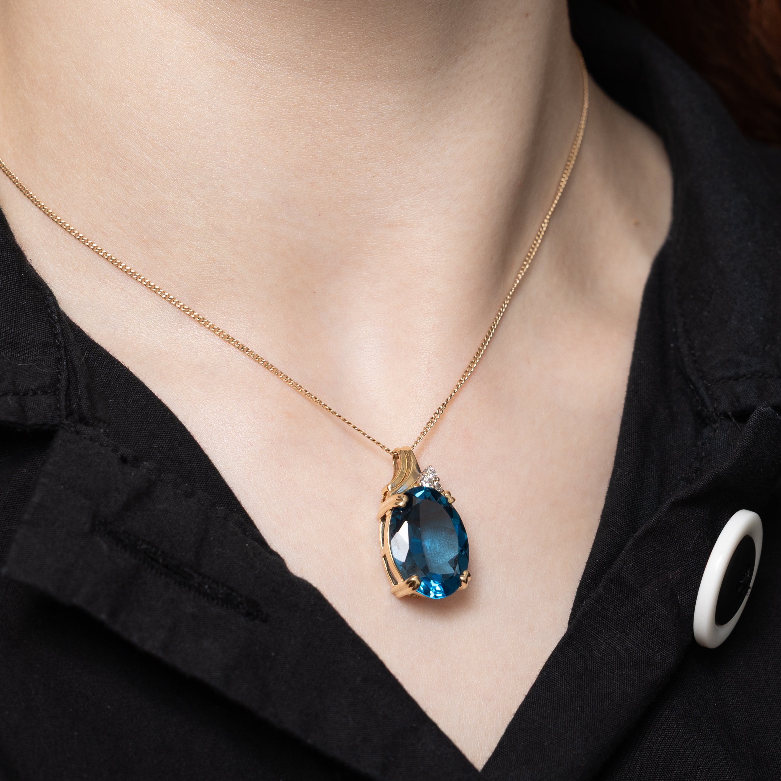 Oval Cut Blue Topaz & Diamond Pendant | 17.90ct, 0.15ctw