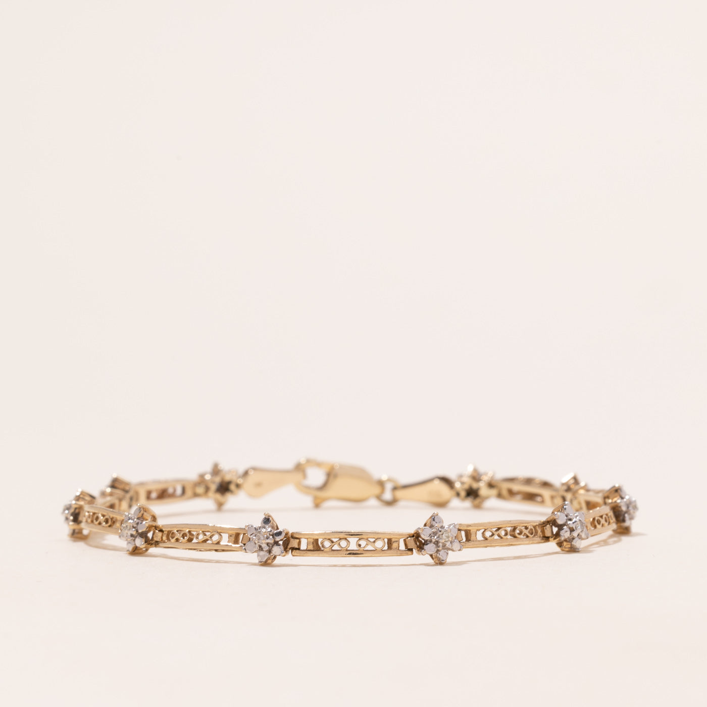 Yellow Gold Diamond Flower Bracelet | 0.05ctw | 6.5"