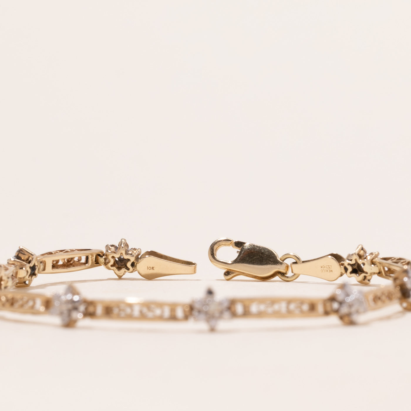 Yellow Gold Diamond Flower Bracelet | 0.05ctw | 6.5"