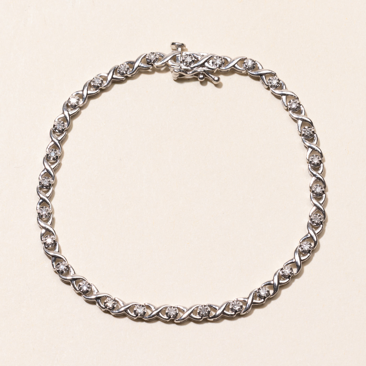 White Gold Illusion Set Diamond X Tennis Bracelet | 0.25ctw | 7.25"