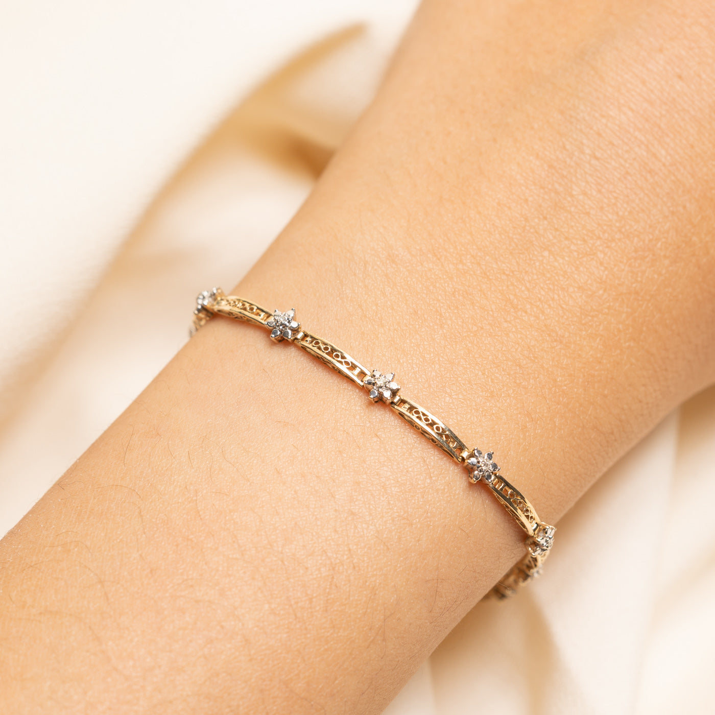 Yellow Gold Diamond Flower Bracelet | 0.05ctw | 6.5"