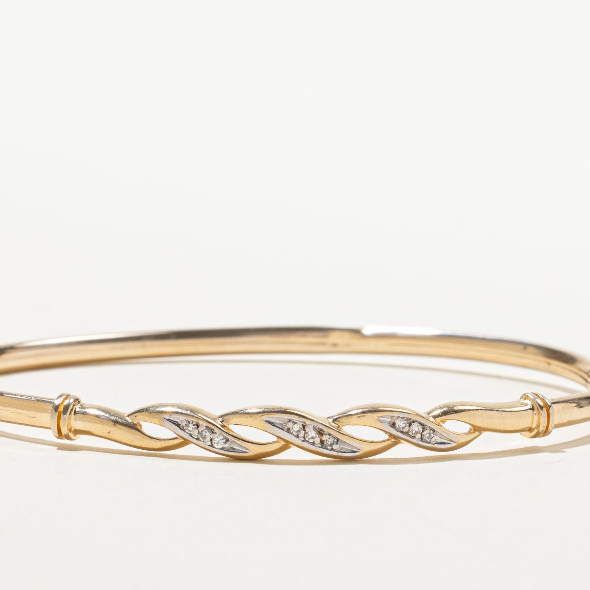 Yellow Gold Diamond Twisted Bangle | 0.08ctw | 7"