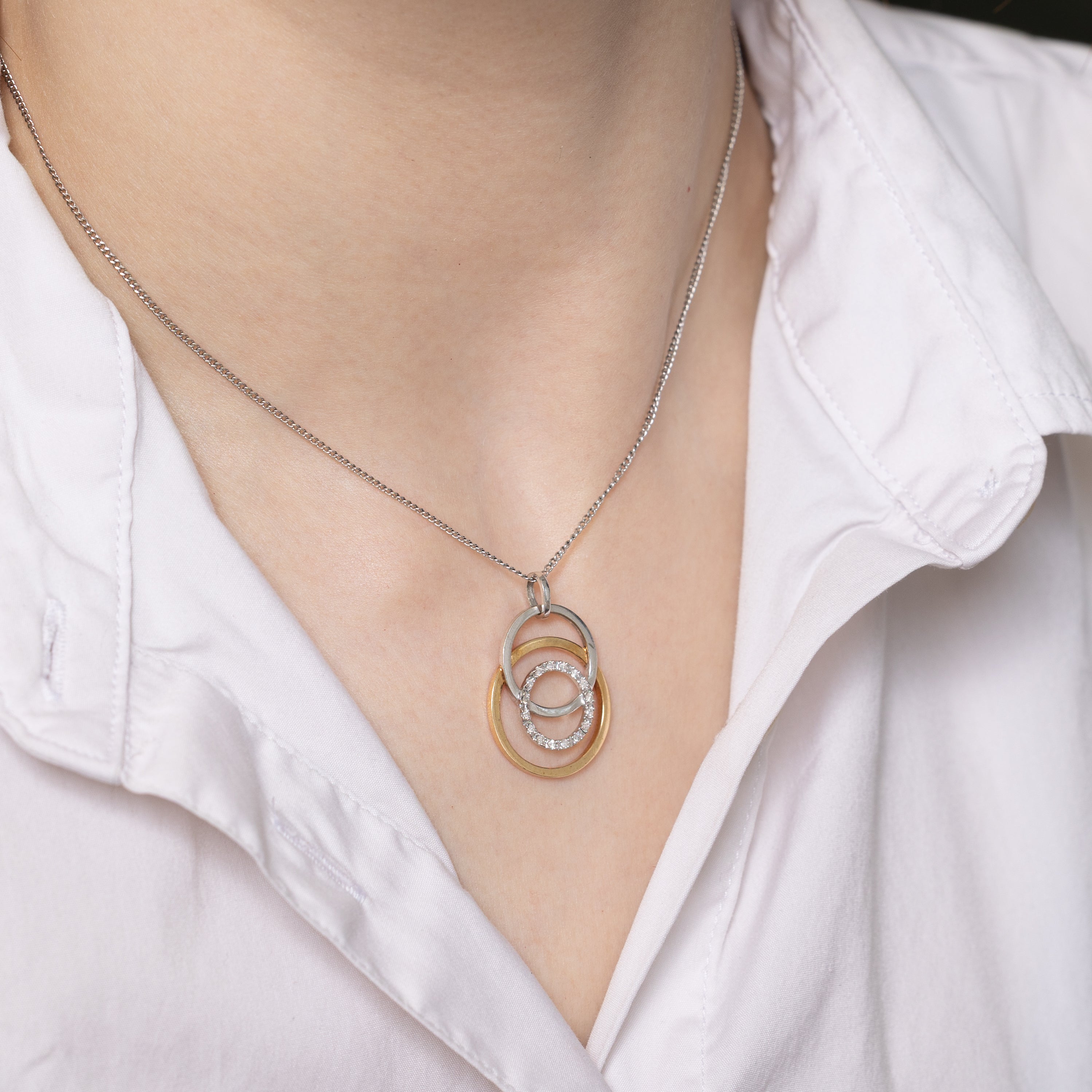 Two Tone Diamond Interlocking Circle Pendant | 0.11ctw