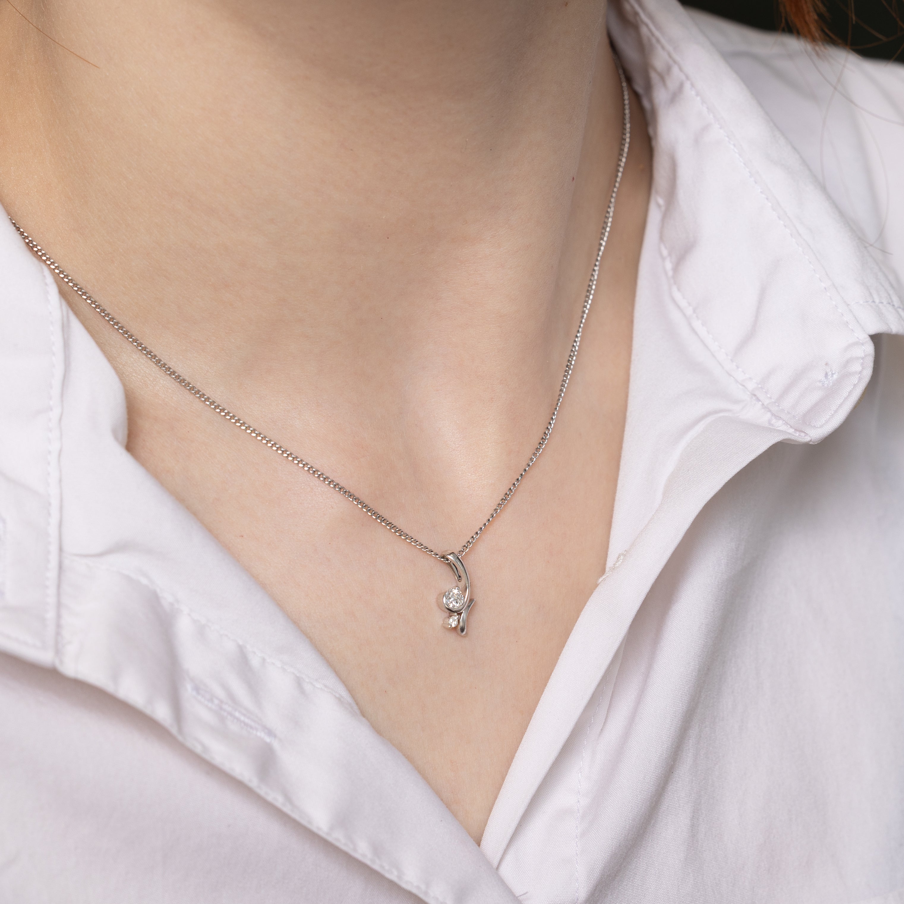 18k White Gold Diamond Swirl Pendant | 0.18ctw
