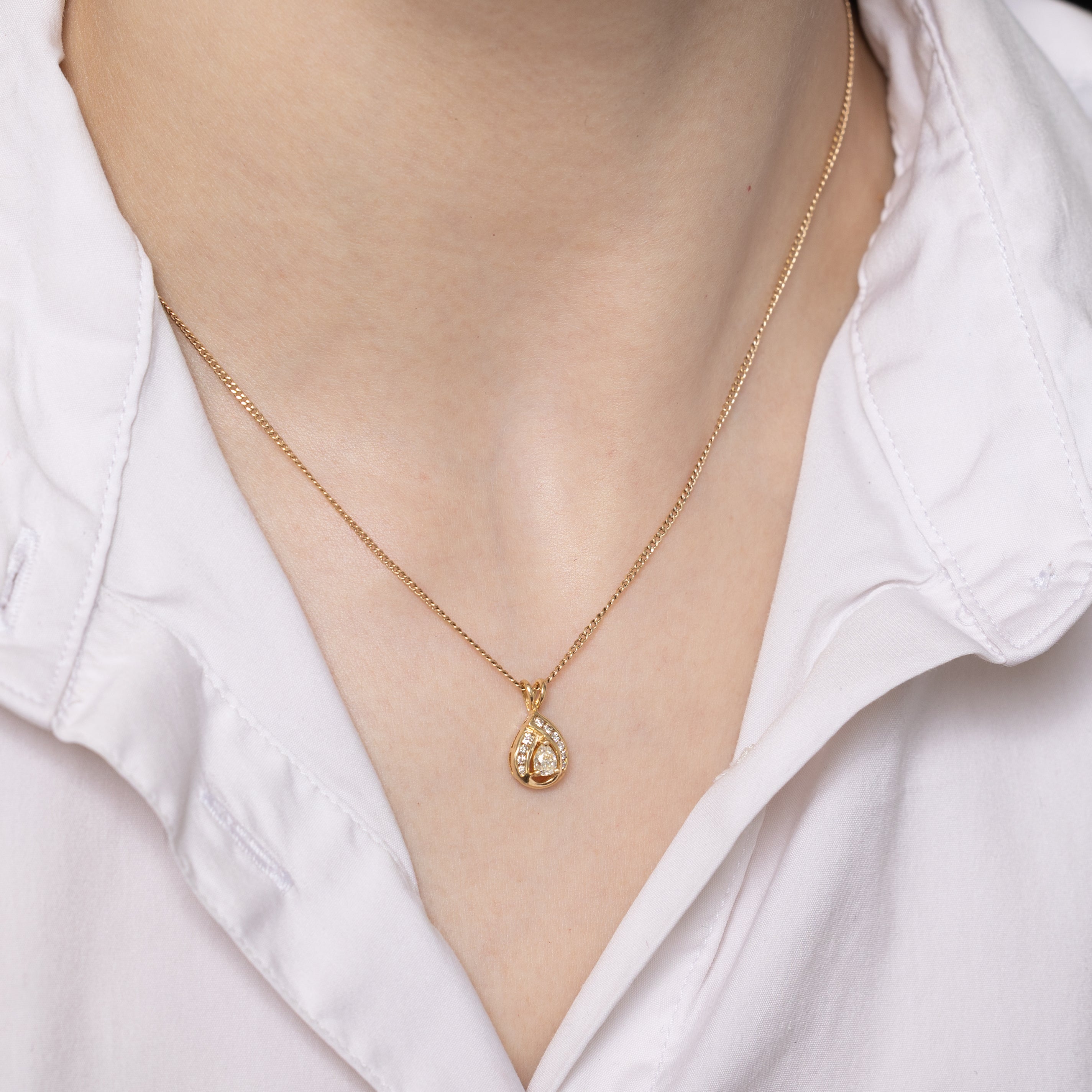 Pear Cut Diamond Halo Pendant | 0.22ct