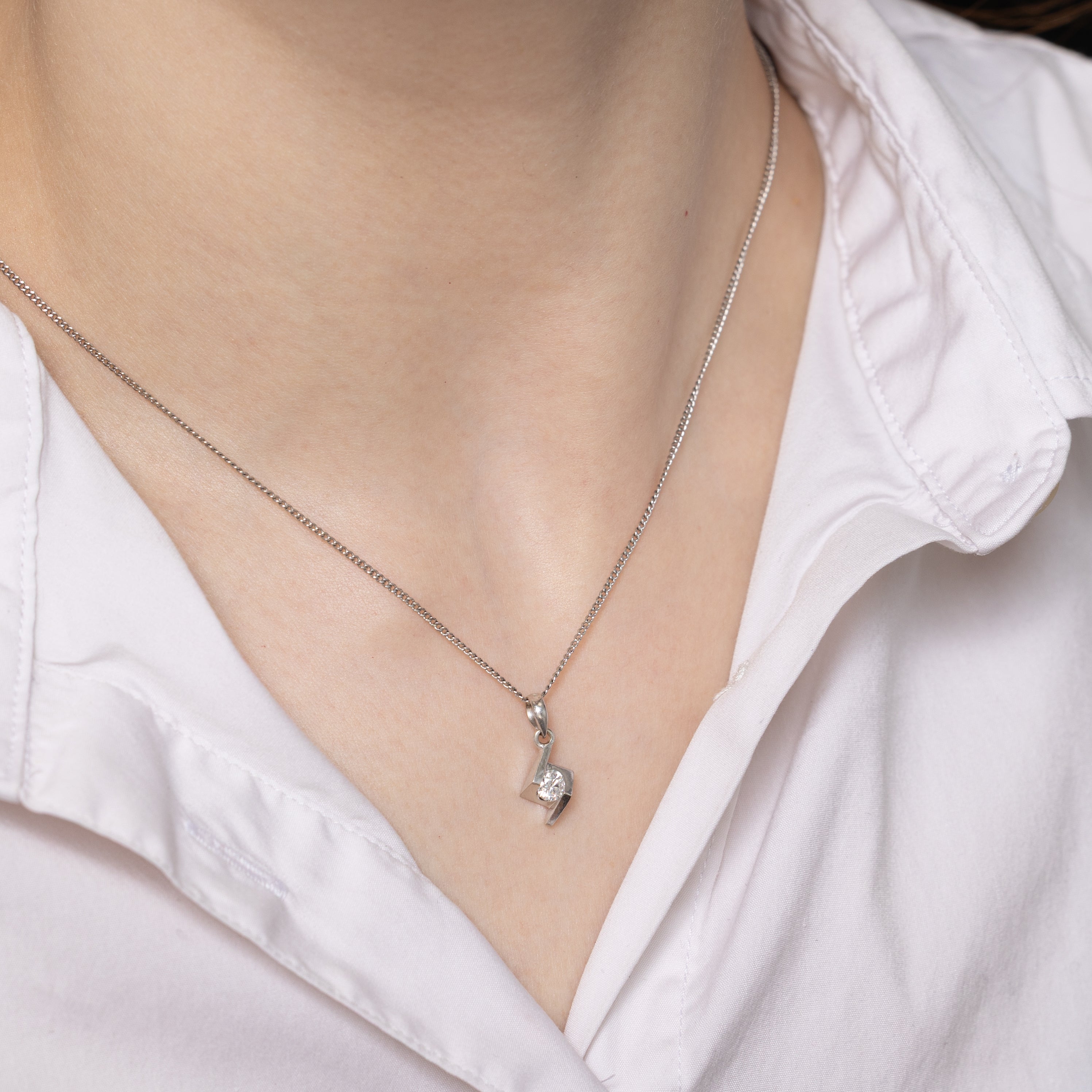 White Gold Tension Set Diamond Zig Zag Pendant | 0.22ct