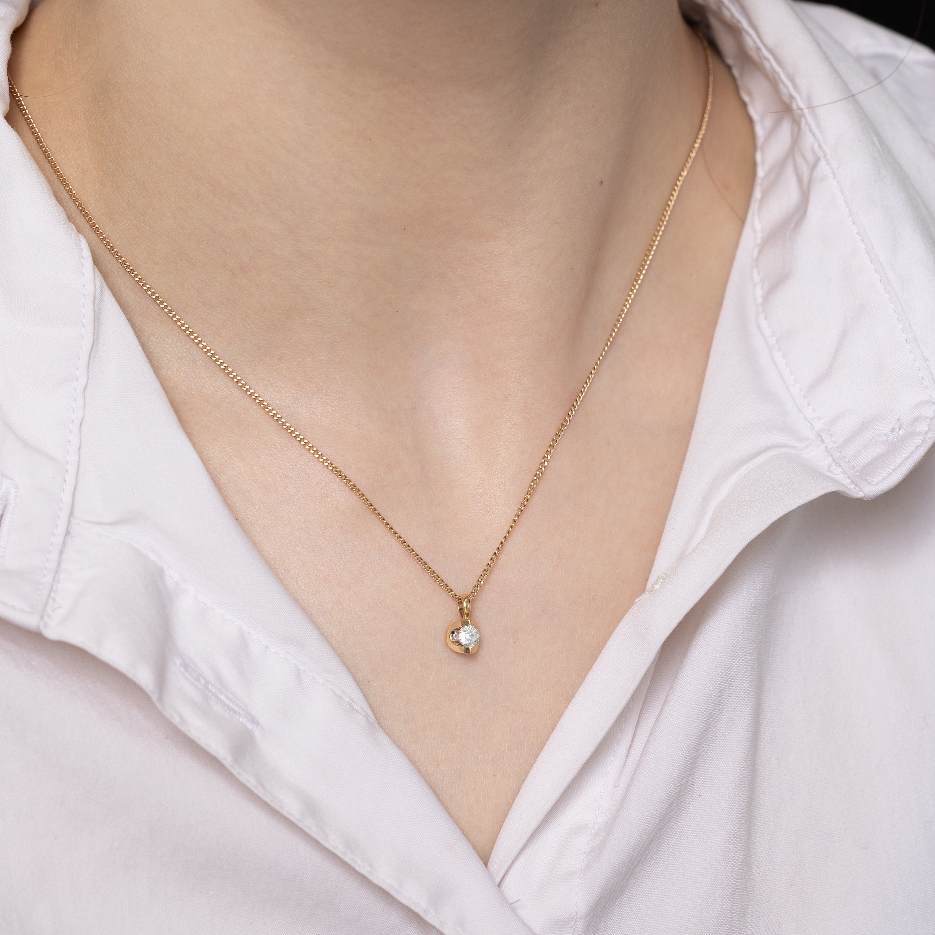 Tension Set Solitaire Diamond Pendant | 0.22ct