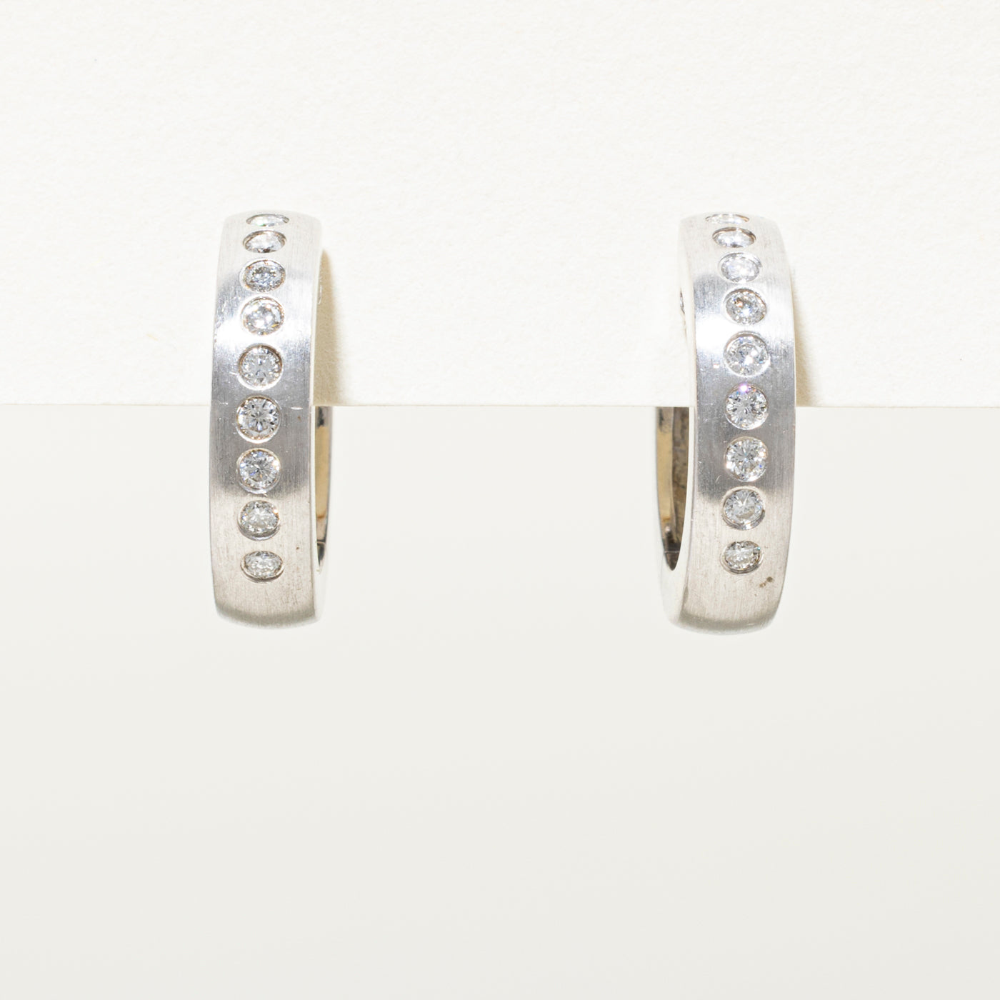 White Gold Flush Set Diamond Hoop Earrings | 0.22ct