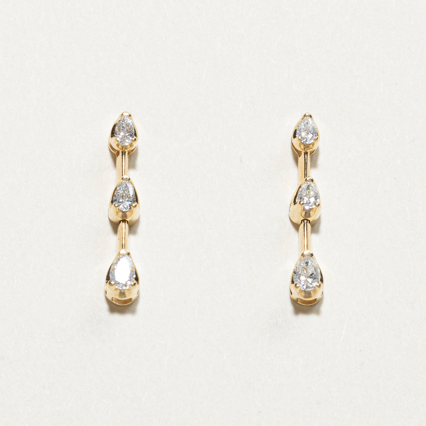 Boucles d'oreilles pendantes à trois diamants | 0,49 ct