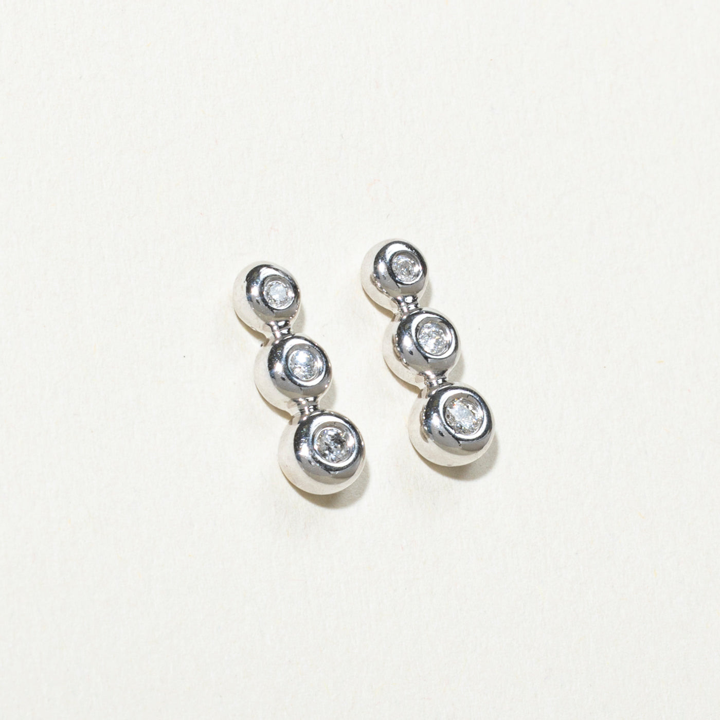 Bezel Set Three Stone Diamond Drop Earrings | 0.14ctw