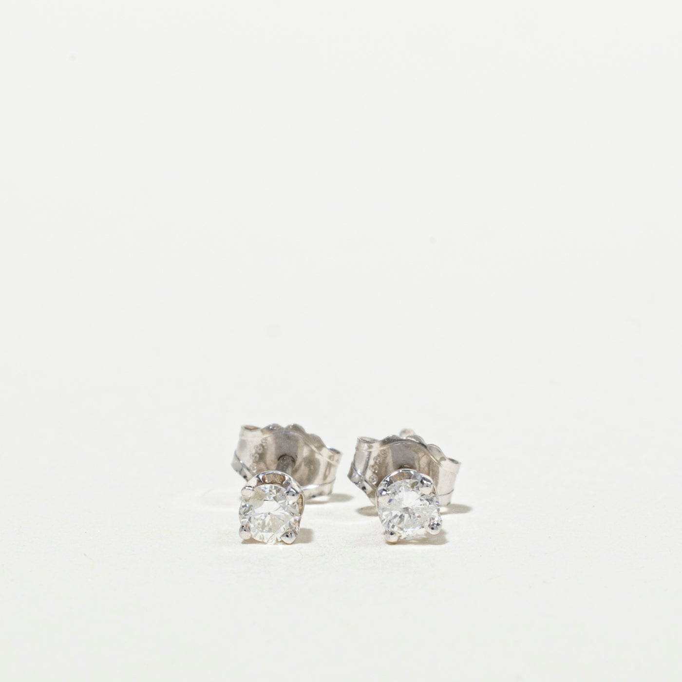 White Gold Solitaire Diamond Stud Earrings | 0.12ctw