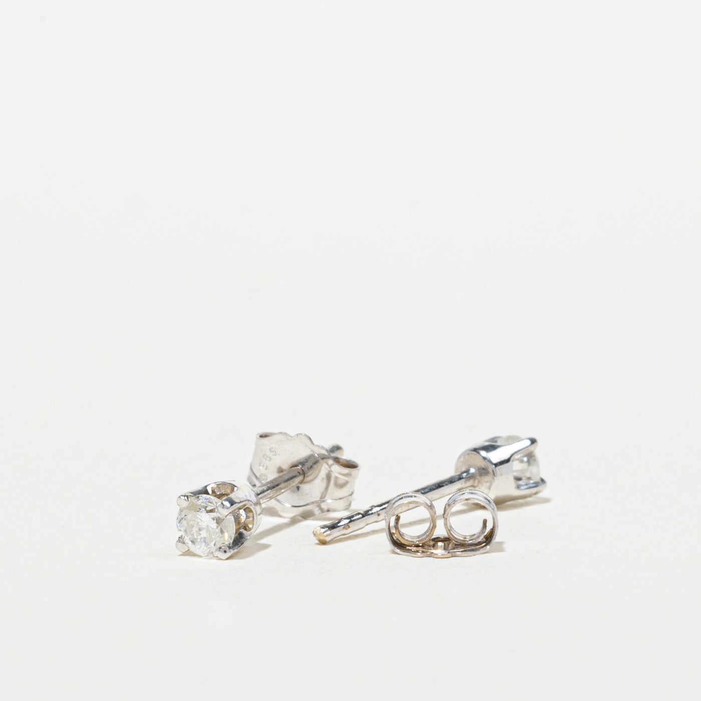 White Gold Solitaire Diamond Stud Earrings | 0.12ctw