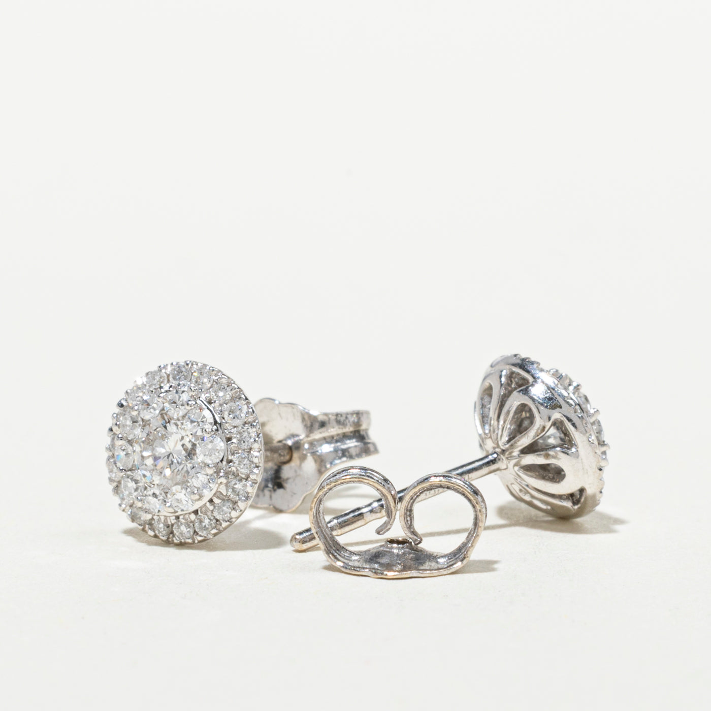 Boucles d'oreilles puces serties de diamants en halo illusion | 0,48 ct