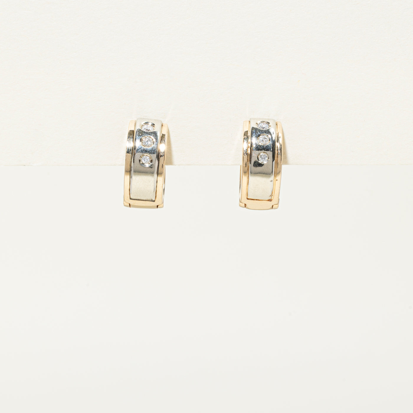 Two Tone Flush Set Diamond Huggie Earrings | 0.1ctw