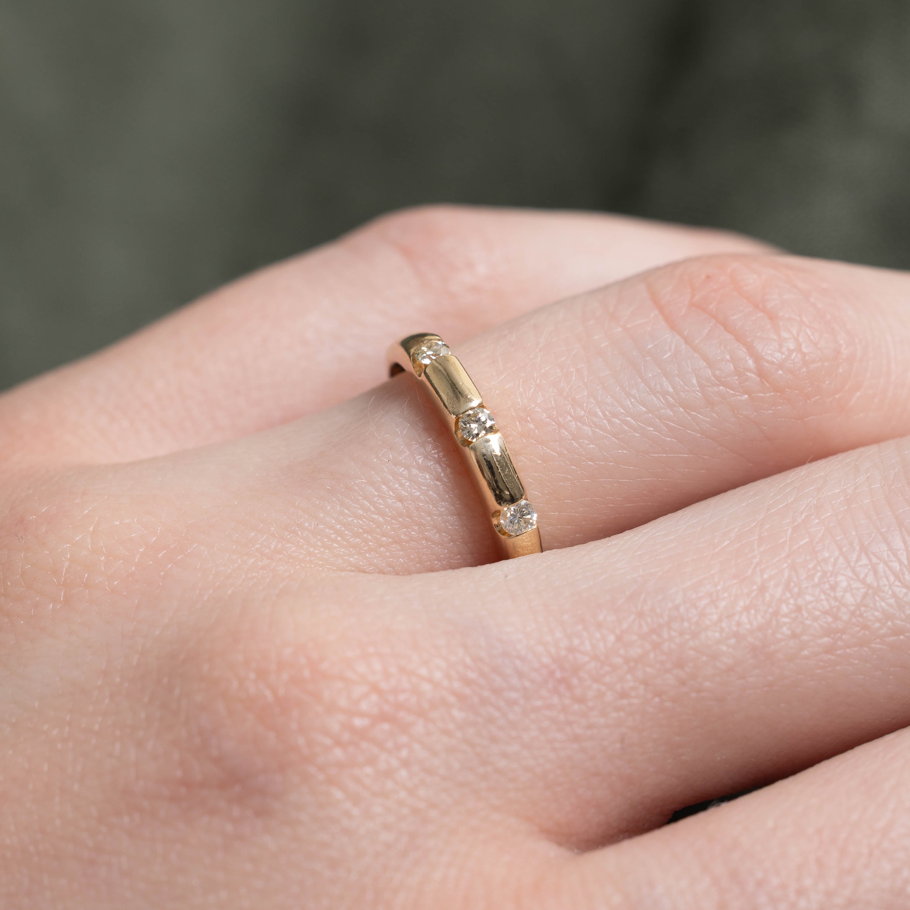 14k Tension Set Three Stone Diamond Ring | 0.10ctw | SZ 8.25