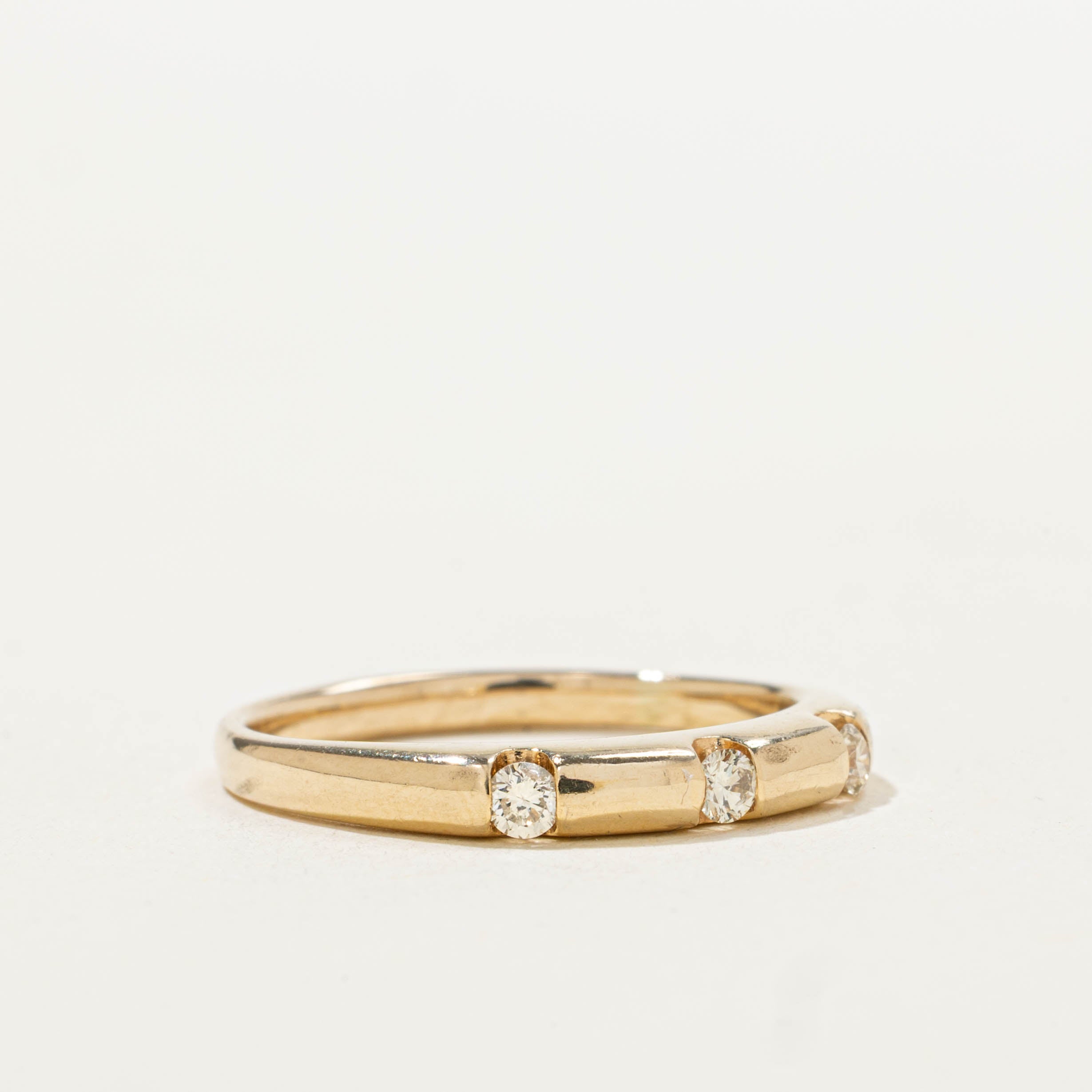 14k Tension Set Three Stone Diamond Ring | 0.10ctw | SZ 8.25