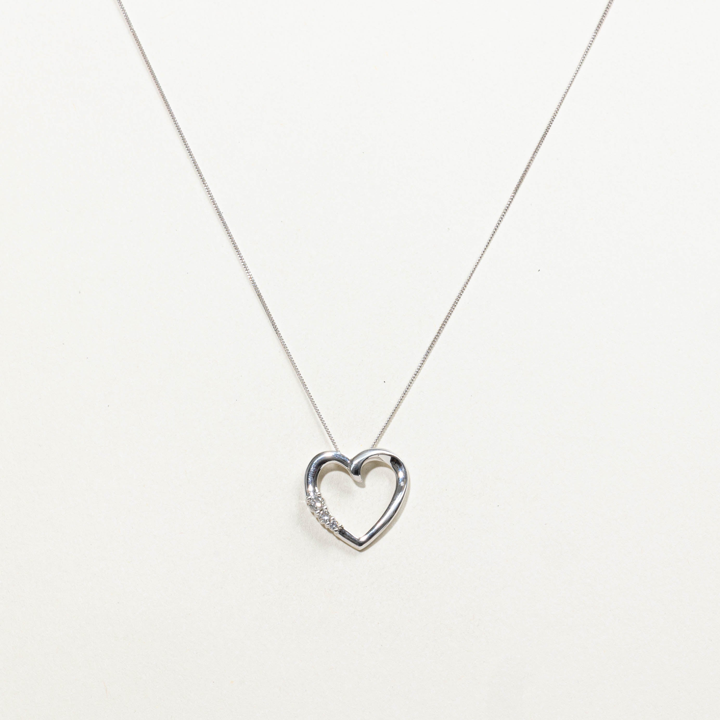 10k Diamond Open Heart Pendant Necklace | 0.13ctw | 18"