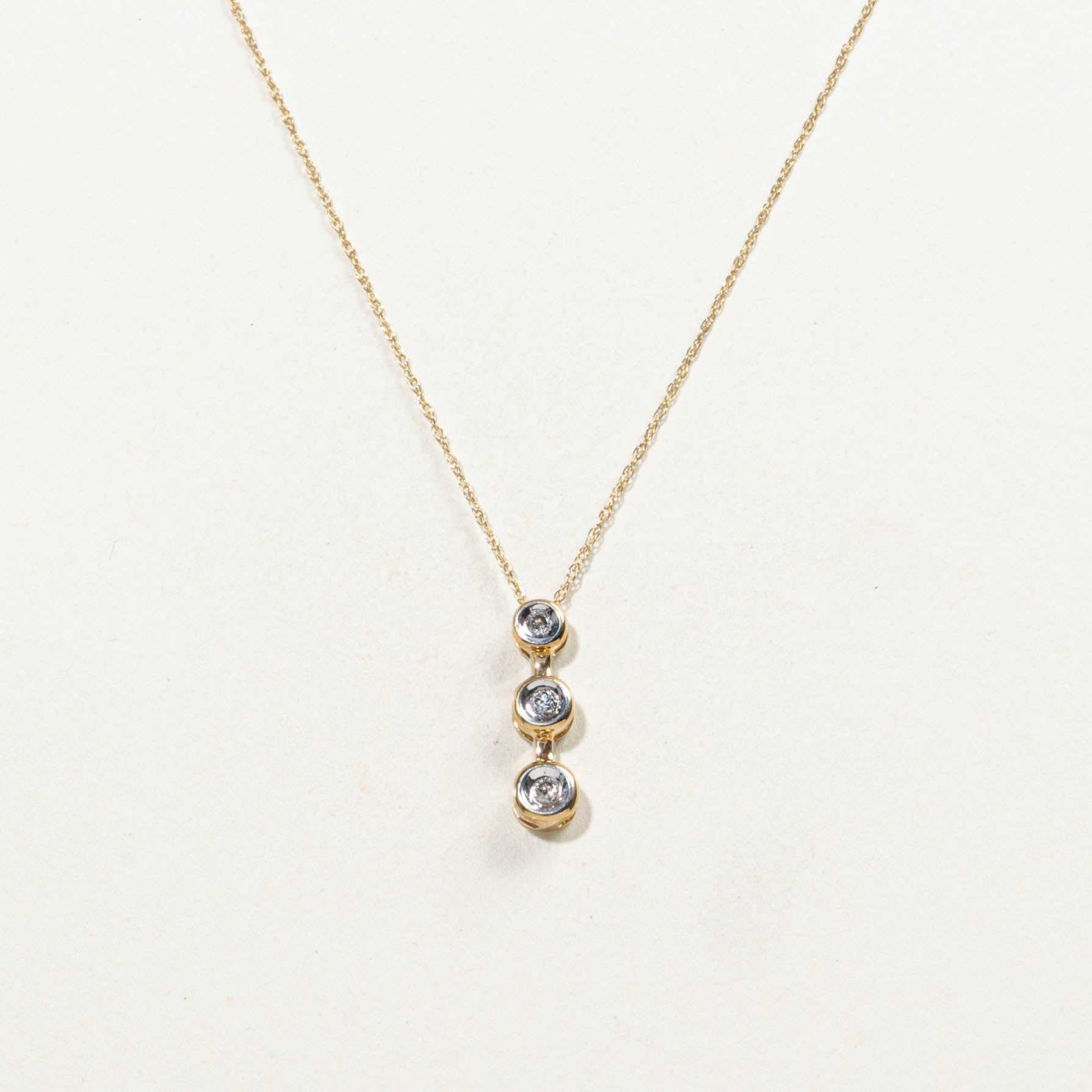 10k Three Stone Diamond Drop Pendant Necklace | 0.07ctw | 19"