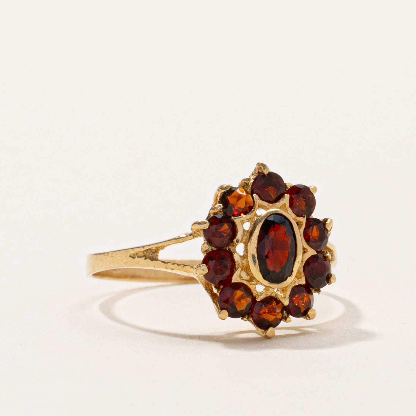 Oval Cut Garnet Petal Halo Ring | SZ 6.75