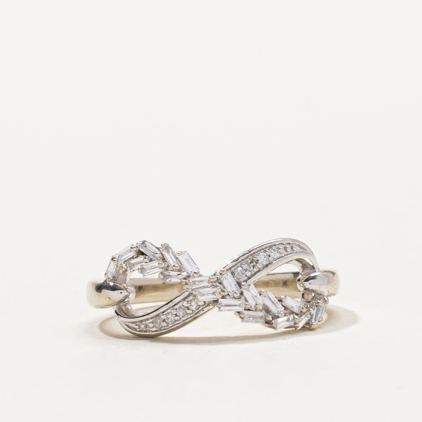 10k Baguette Cut Diamond Infinity Ring | 0.20ctw | SZ 5