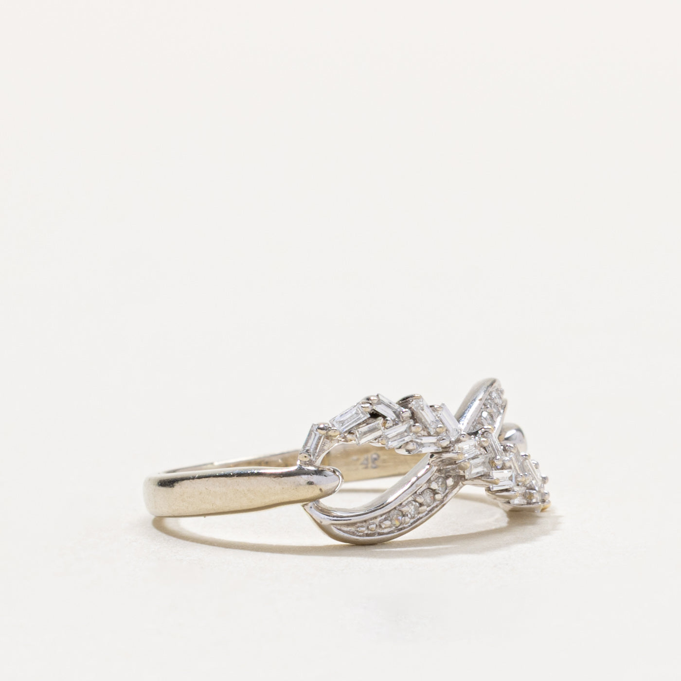 10k Baguette Cut Diamond Infinity Ring | 0.20ctw | SZ 5