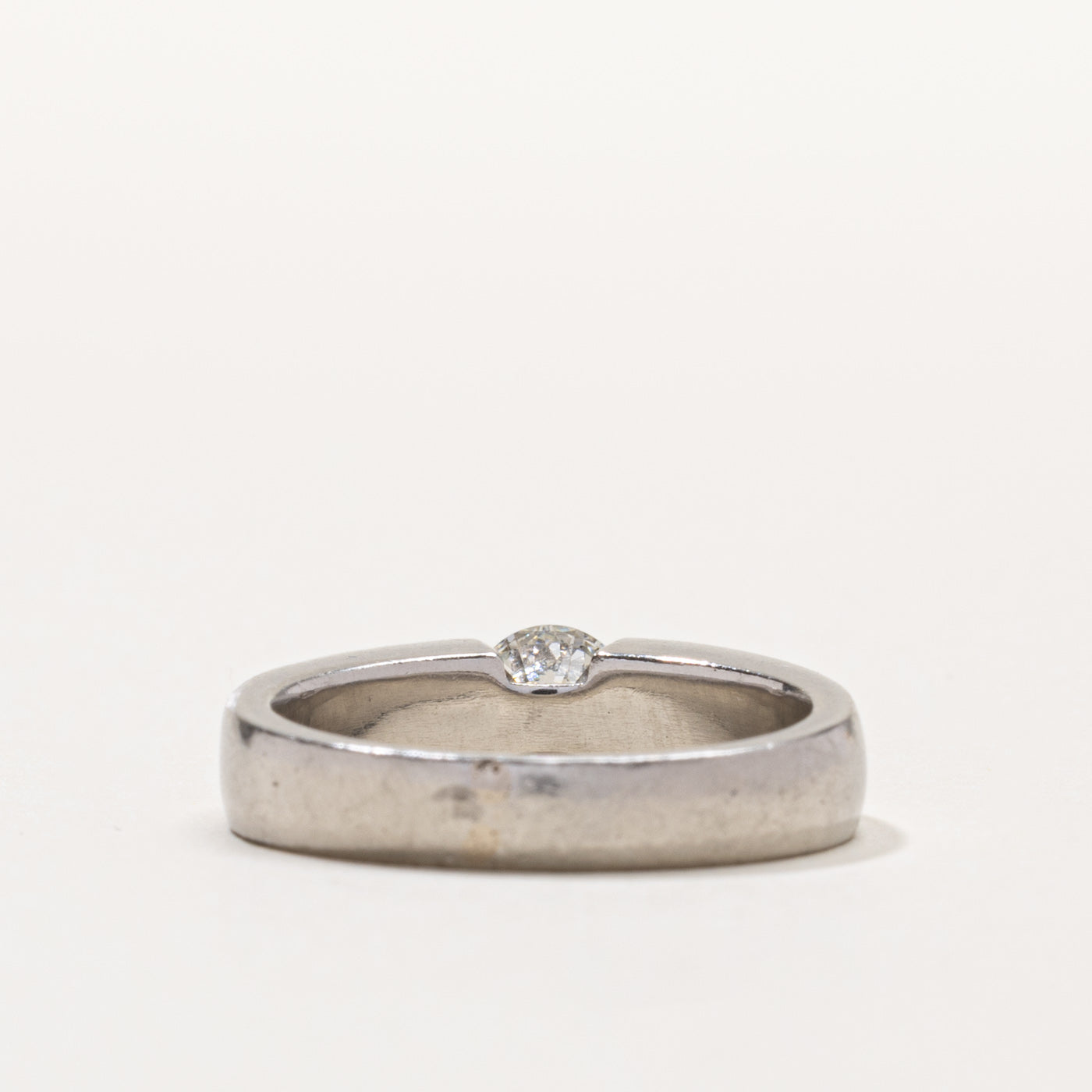 Palladium Round Brilliant Cut Tension Set Diamond Ring | 0.55ct SI1 G/H | SZ 6.5