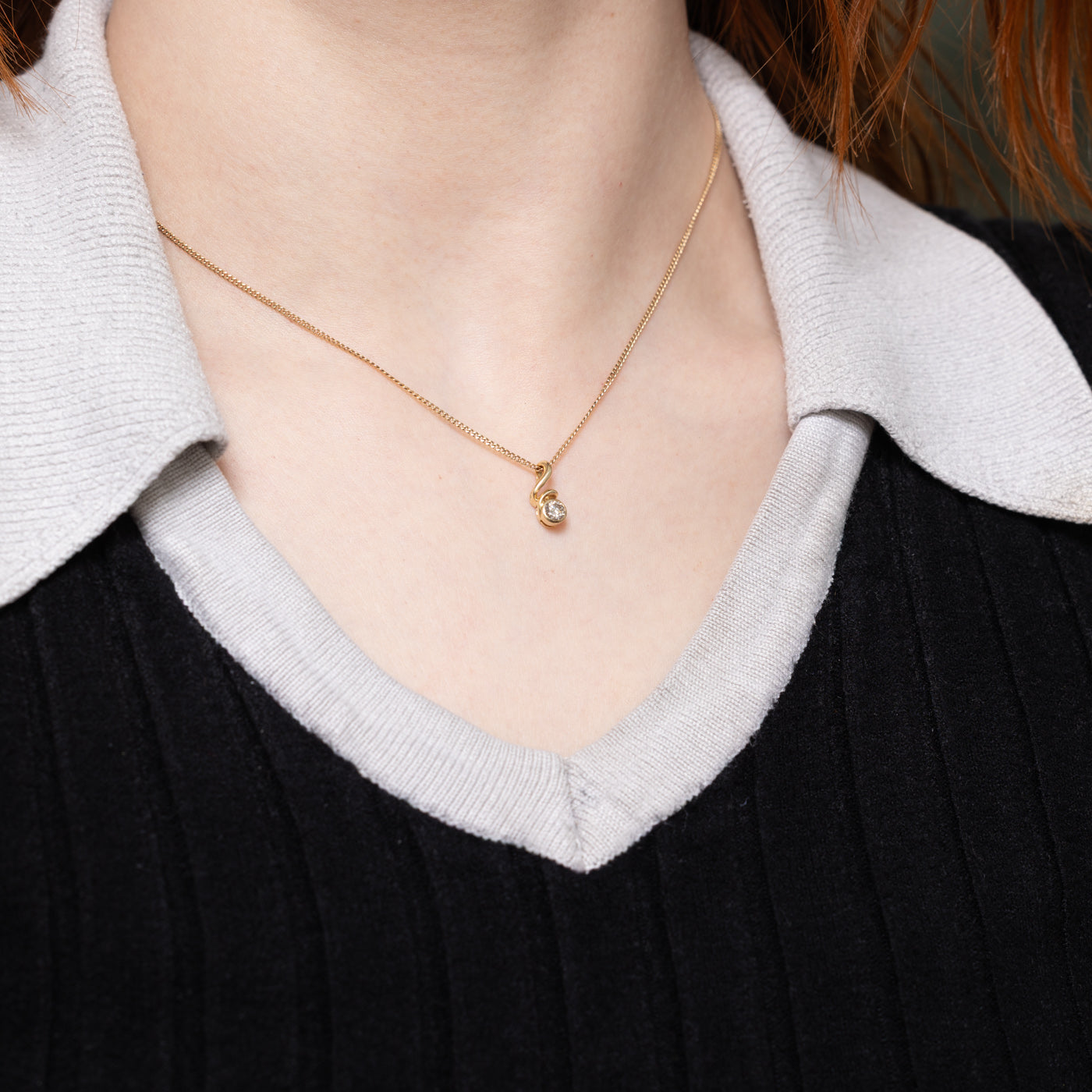 14k Bezel Set Diamond Swirl Pendant | 0.22ct