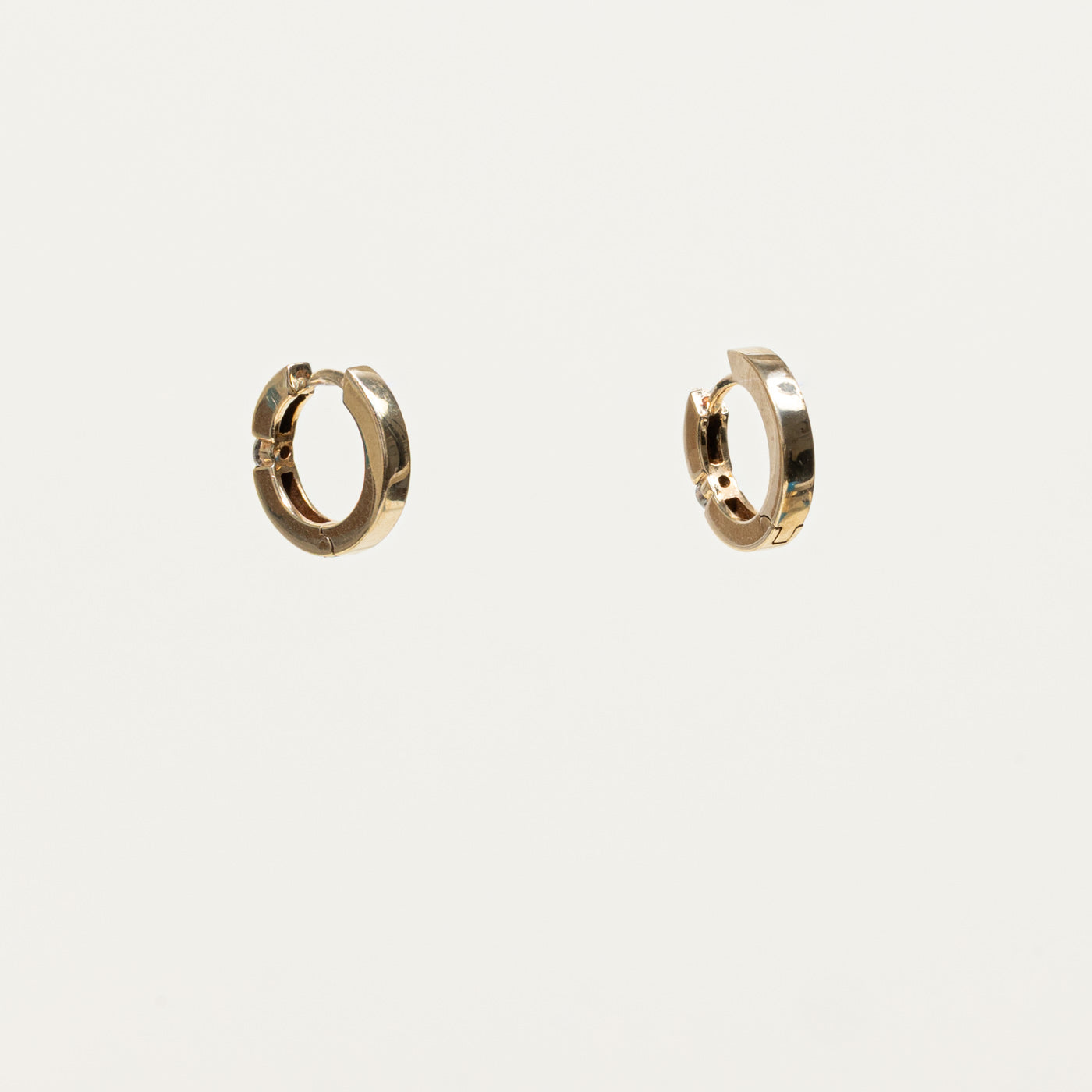 10k Single Diamond Huggie Earrings | 0.15ctw