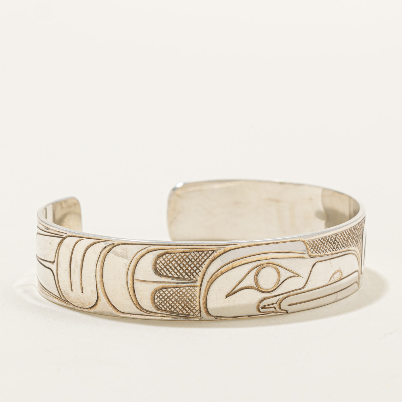 'Travis Henry' Sterling Silver Indigenous Carved Raven Cuff | 6"