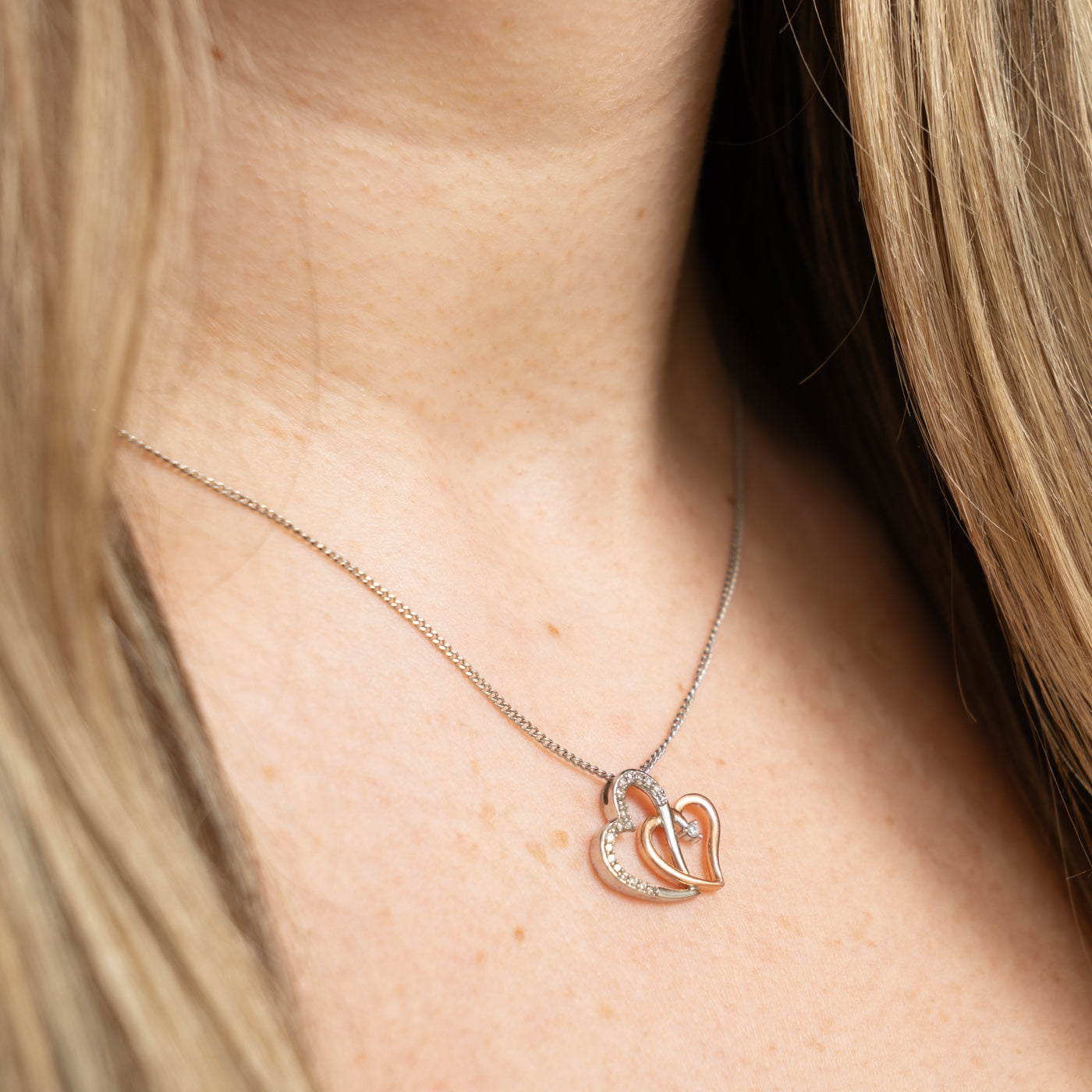 10k Two Tone Gold Diamond Hearts Pendant | 0.05ctw