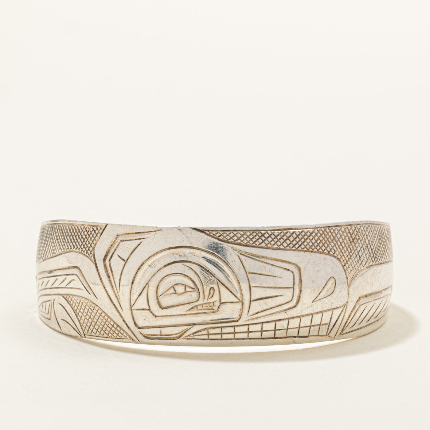 Sterling Silver Indigenous Carved Wolf Cuff | 6"