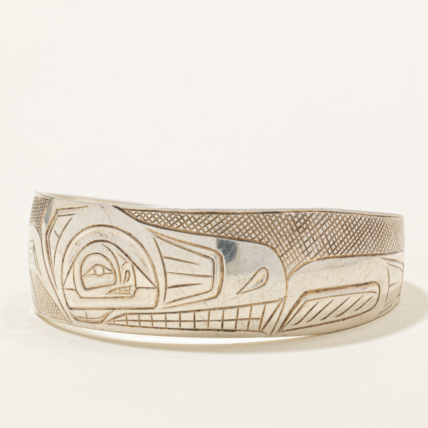 Sterling Silver Indigenous Carved Wolf Cuff | 6"