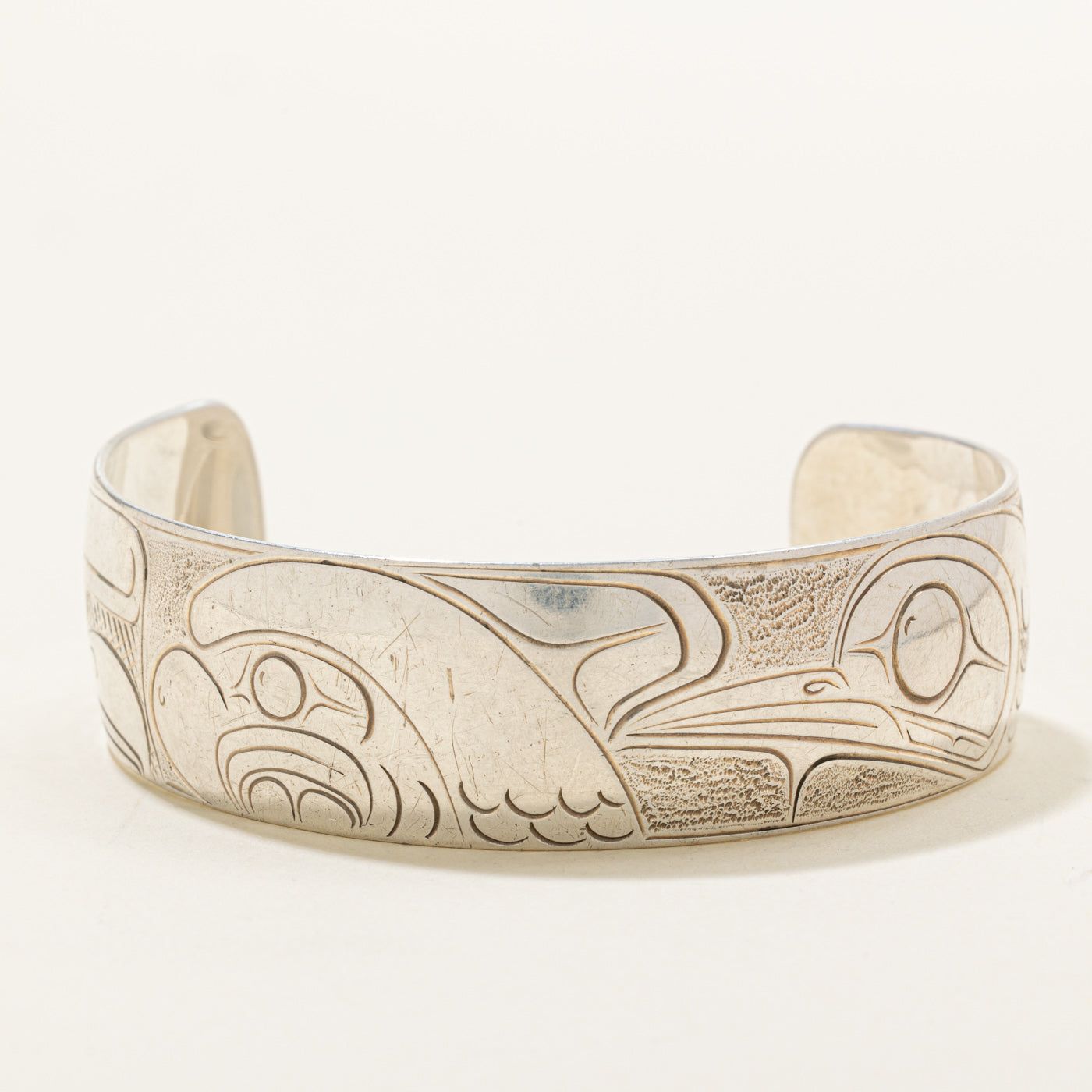 Sterling Silver Indigenous Carved Eagle & Hummingbird Cuff | 6"
