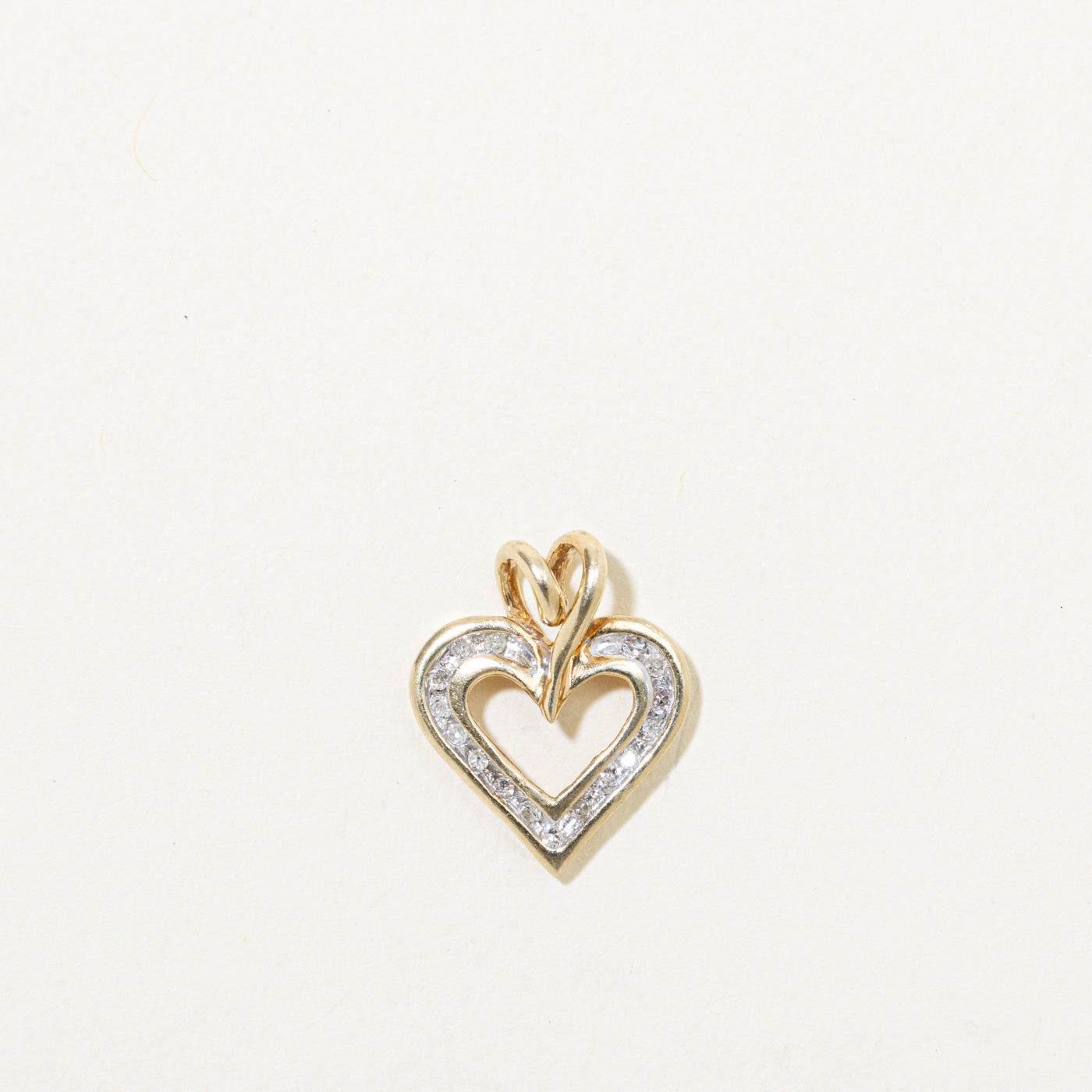 10k Channel Set Diamond Heart Pendant | 0.06ctw