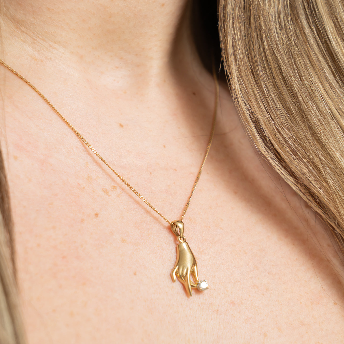 14k Diamond Hand Pendant | 0.16ctw