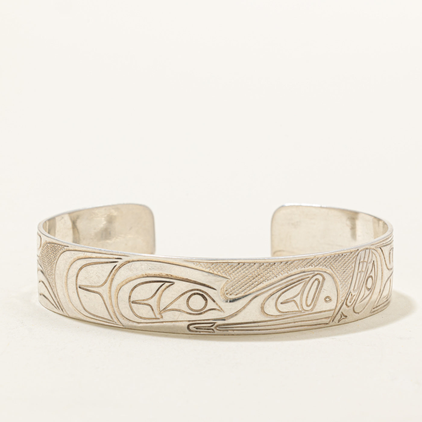 'Travis Henry' Sterling Silver Indigenous Carved Orca & Bird Cuff | 6"