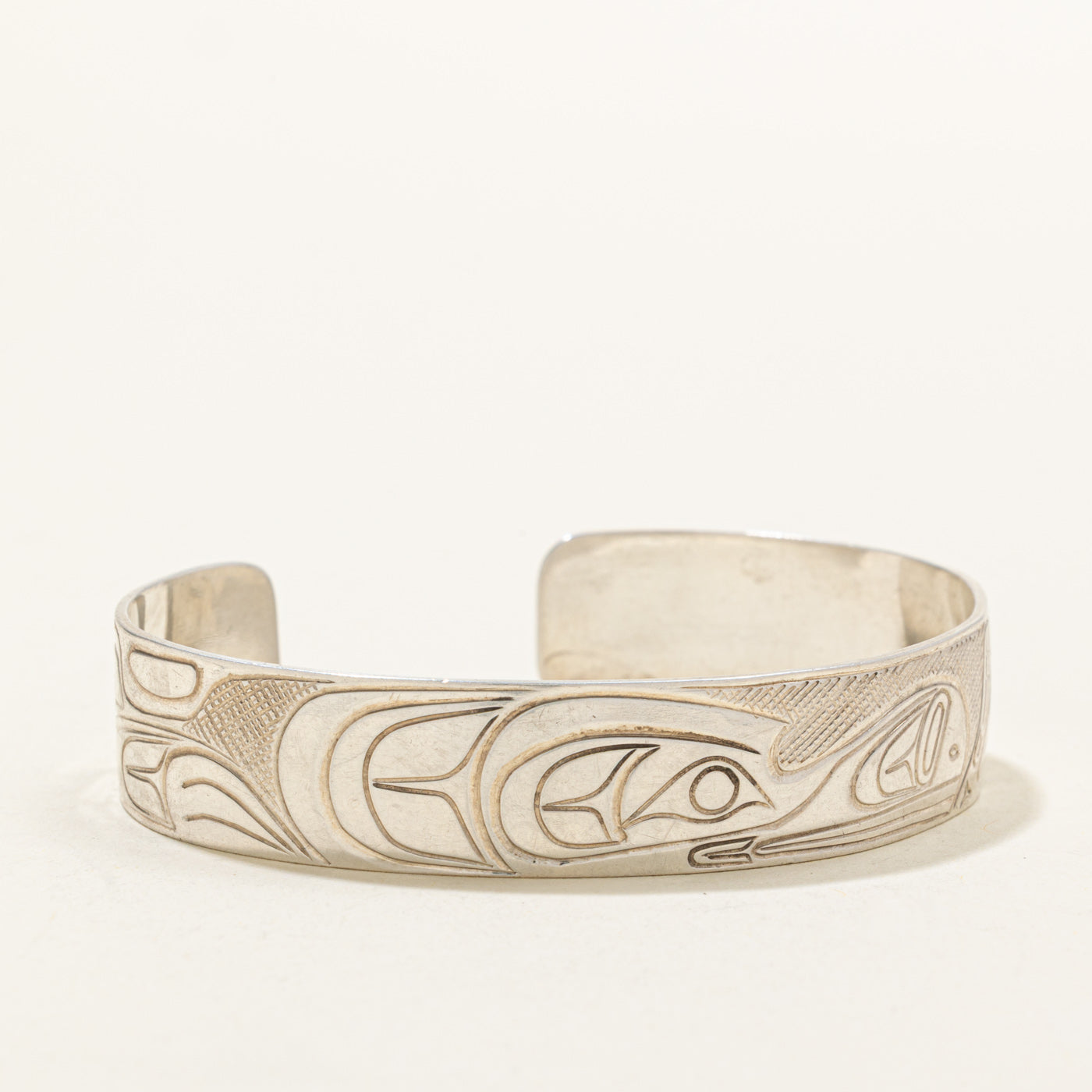 'Travis Henry' Sterling Silver Indigenous Carved Orca & Bird Cuff | 6"